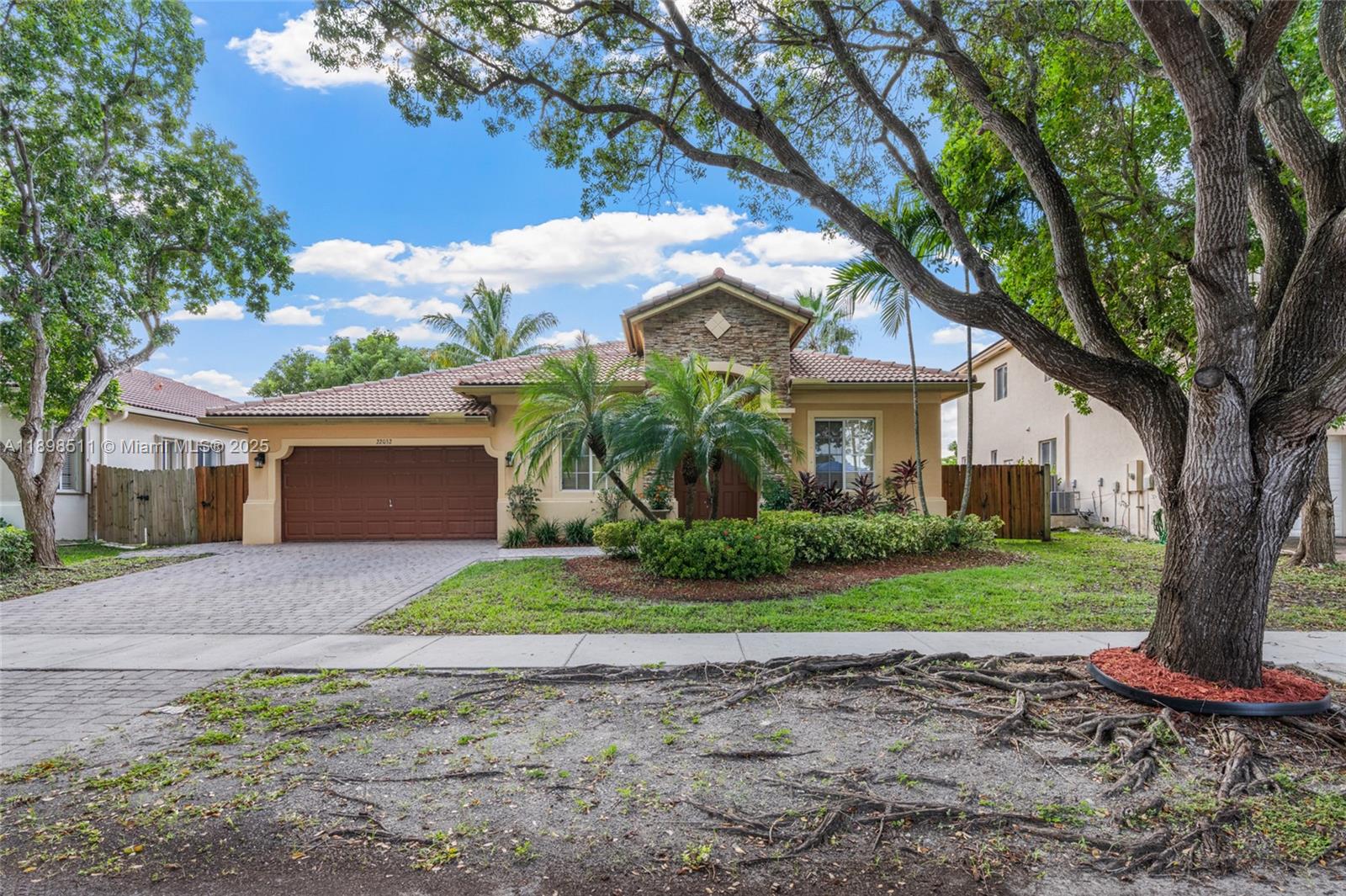 Experience lakeside living in Cutler Bay capturing the sunset straight from your backyard. This open-concept home offers stunning lake views, a spacious layout, and a peaceful setting. Perfect for outdoor enthusiasts and those seeking a serene lifestyle. House features a split floor plan with high ceilings throughout. Easy to Show!