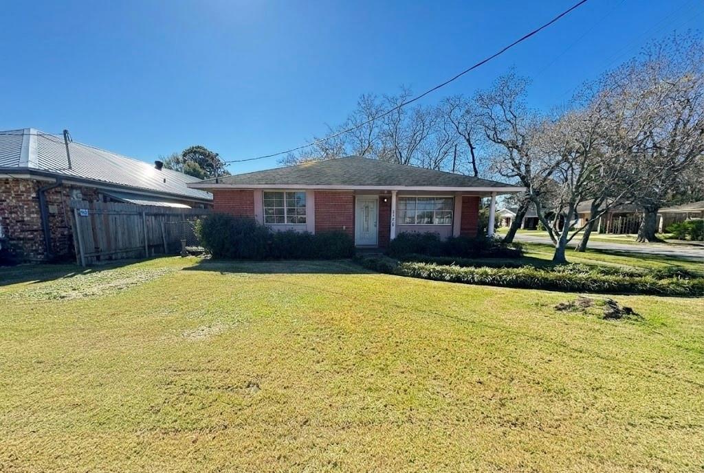 Discover the potential of this approximately 1,600 sq. ft. home on a corner lot in a sought-after Metairie neighborhood. Featuring 3 bedrooms and 2 baths, offering a comfortable layout, ready for renovation and updating to suit your personal style. The detached garage includes a camelback-style upstairs space, accessible via a side entrance staircase . Great for added storage, hobby, or work space but will need complete renovation. Enter staircase and upstairs of detached garage with caution. The detached structure will need complete renovation or a possible tear down and has no utilities connected.  This home is  conveniently located to shopping, dining, and major roadways. It is ready for buyers seeking a property to customize and create their own dream home or  tear down current home and build a new  home. Detached garage and upstairs space are approximately 1,169 square feet and is part of the total footage. Succession property. Sellers will make no repairs.