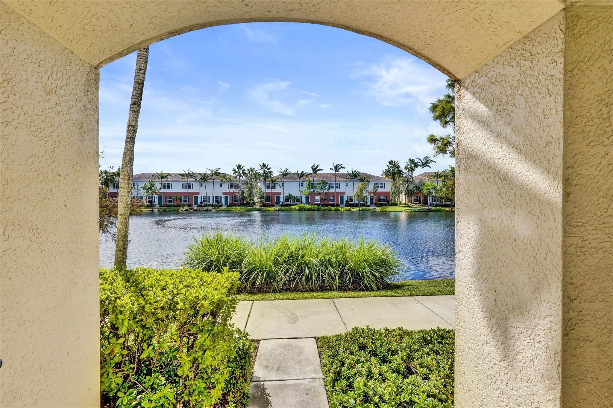 Lakefront 4 bed / 4 bath townhouse in desirable Orchid Grove! 2,733 Sq. Ft of living space (largest units in the community), 2-car garage with 2 additional driveway spots, new modern engineered wood flooring, gorgeous kitchen w/lots of cabinet and counter space, spacious primary bedroom w/large attached bathroom and 2 walk-in closets, plenty of storage, laundry room w/washer and dryer and utility sink on bedroom level, 4th bedroom/bonus room great for office/playroom/4th bed. HOA includes high speed WiFi, digital cable and ADT alarm. New multizone WiFi controlled AC system, full access to community clubhouse, pool and 24/7 fitness center. Currently rented for $3825/month