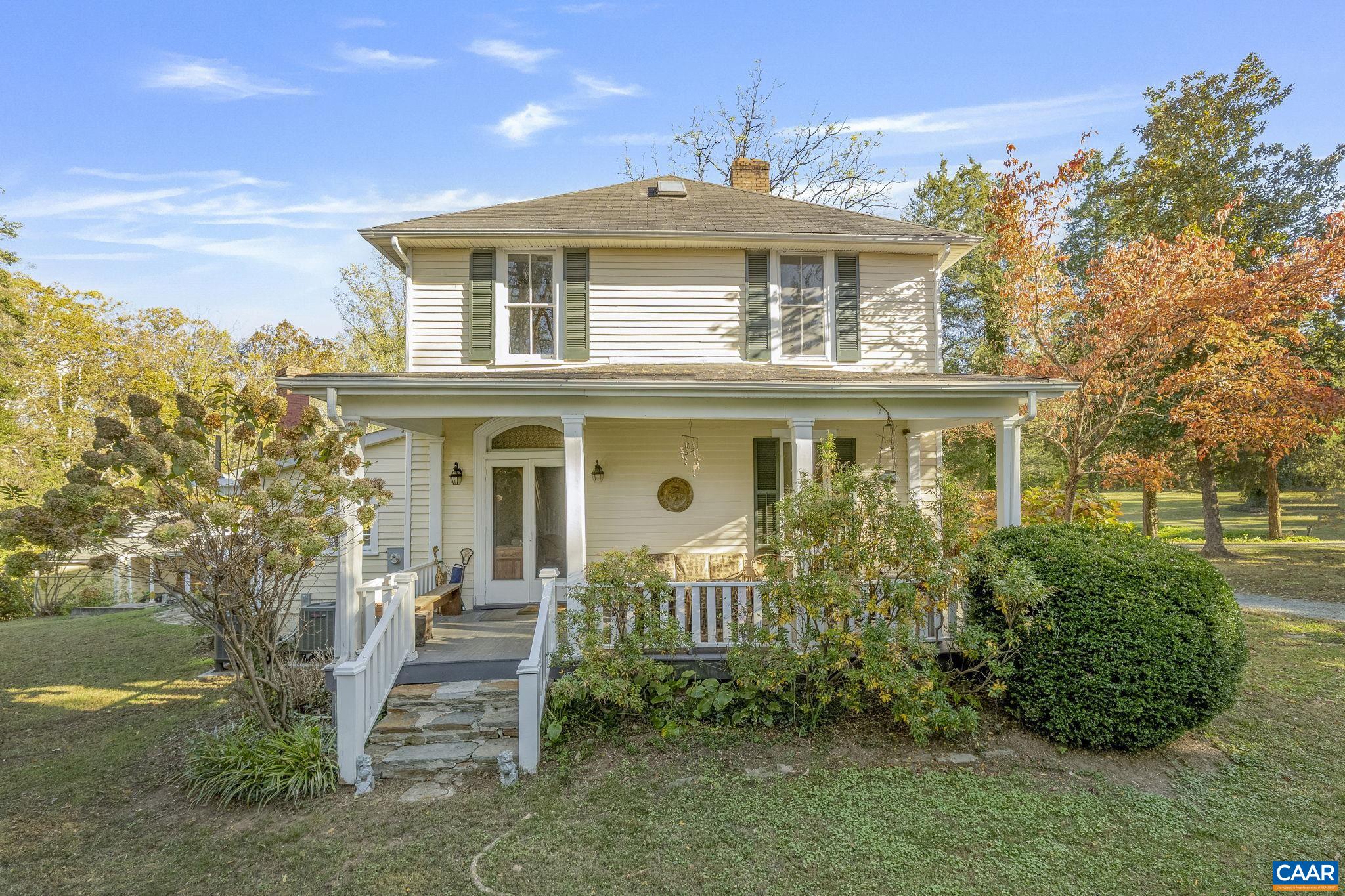 Mulberry Hill ~ c.1900 in Keswick Hunt Country. The main house and guest house are both contributing historic dwellings in the Southwest Mountains Rural Historic District. A fine example of the vernacular Victorian style with a grand hall, 10-foot ceilings, hardwood floors and a central chimney with two fireplaces. A cozy one-bedroom guest cottage is nestled close to the rear of the house. This property has development rights with building sites to support a manor House and stables. The property has mature woodlands of hardwoods and the topography is level with complete privacy. This region of central Piedmont has been described as an abundance of open land that affords expansive vistas of the unspoiled countryside. The two residences qualify for historic renovation tax credits. Wonderful gardening spaces and a bold stream bordering Historic Grace Episcopal Church.
