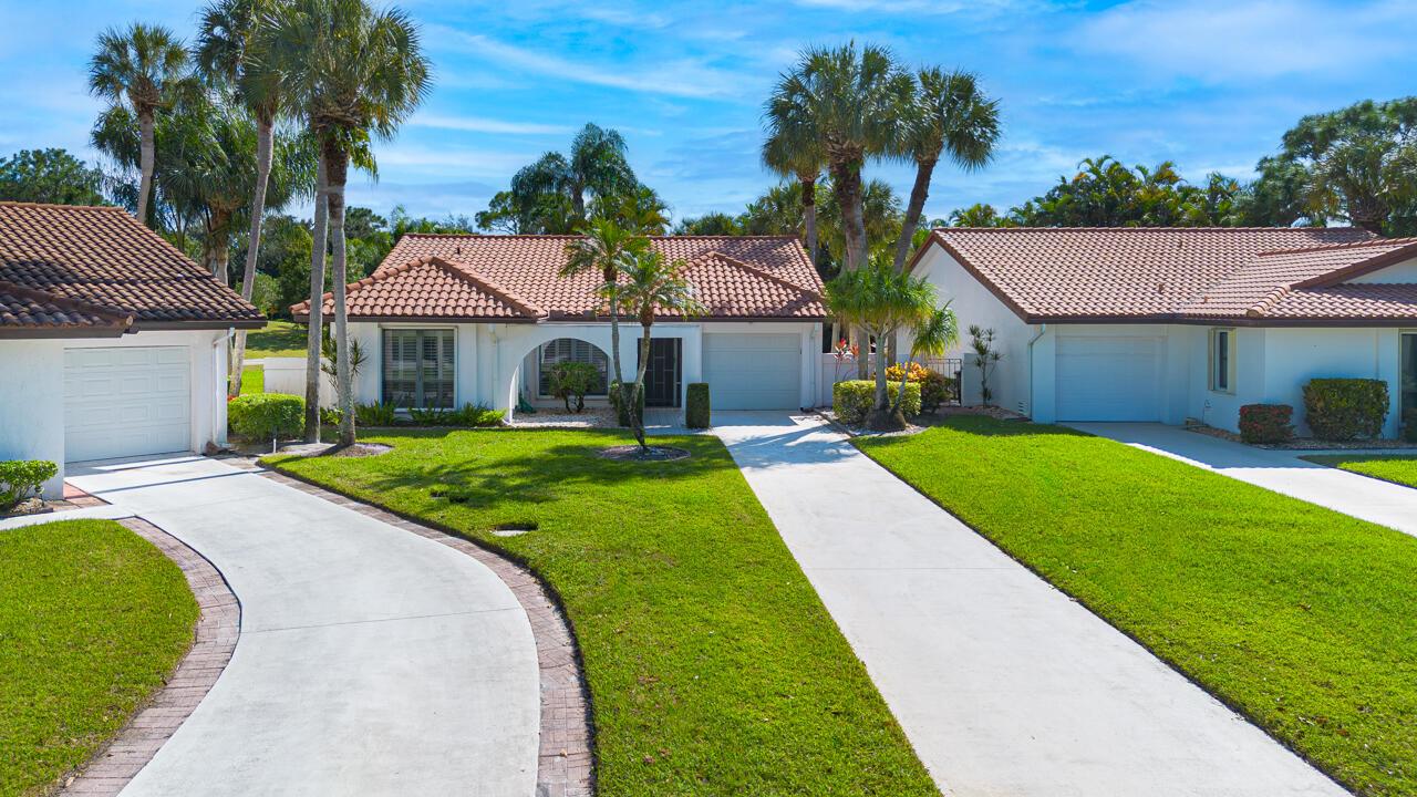 Welcome to this beautifully maintained 3-bed, 2-bath CBS home in the desirable Osprey Creek community of MDCC/West Villages. Features include cathedral ceilings, plantation shutters, and an open layout perfect for relaxed living and entertaining. The kitchen offers upgraded appliances, new cabinetry, and a designer backsplash, flowing into a bright dining area and wet bar. The spacious primary suite includes a walk-in closet and a modern, updated bath. Enjoy year-round outdoor living from the screened porch, surrounded by lush landscaping. Extras include accordion shutters, a 1-car garage, and an extended driveway fitting 5-6 vehicles. Close to A-rated schools, golf, shopping, dining, I-95, and the Turnpike. Optional memberships: Martin Downs Golf Club - golf, spa, dining (martindownsgolf