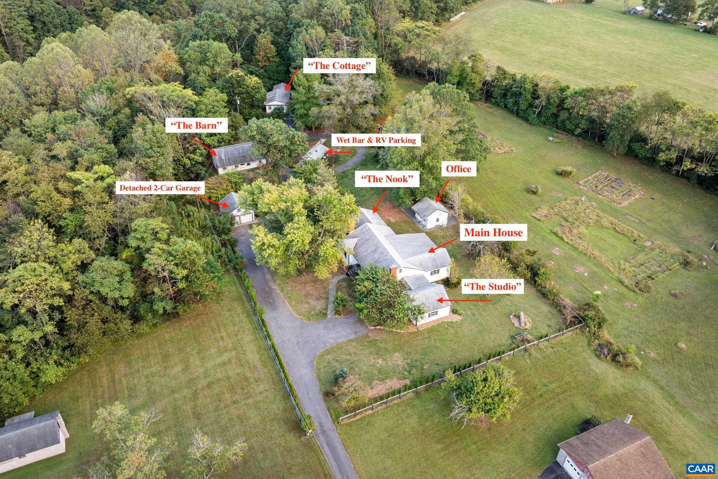 Welcome to Windhaven Cottages, a unique and charming AFTON property nestled in the heart of popular Nelson County WINE & BREW COUNTRY! This private ENCLAVE with several dwellings is the quintessential weekend address with solid vacation-rental history for many years. Mountain views! Calling all INVESTORS seeking a solid ROI! Live onsite and manage rentals OR collect rent on all FIVE STR's! Property showcases a lovely 5BR home including 3BR main residence flanked by two furnished studio apartments. Two separate guest cottages complete the scene, both turnkey furnished and earning income. Could also make a terrific FAMILY COMPOUND for multiple generations! So much room to spread out with a detached HOME OFFICE (fiber optic!) as well as a rustic, detached wet bar ready to serve up local fare. ENCHANTING SPACES, indoors and out! Park your RV or boat. Revive the chicken coop for fresh eggs and feathered friends. Dual zoning brings even more opportunity and a detached garage offers plenty of storage or room for vehicles. All this, and in a PITCH PERFECT LOCATION near popular Nelson venues, hiking, conveniences in Crozet or the Valley, and just 25 min to Charlottesville. PLEASE NO DRIVE-BY VISITS WITHOUT APPOINTMENT.