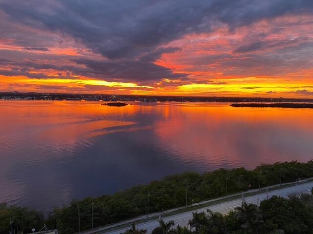 &#127796; SOUTHWEST-FACING CORNER RESIDENCE | PANORAMIC OCEAN & INTRACOASTAL VIEWSExperience breathtaking, unobstructed views from this southwest-facing corner unit offering over 1,600 square feet of light-filled living space. Enjoy wrap-around balconies capturing stunning vistas of the Atlantic Ocean, Intracoastal Waterway, and tranquil lagoon--the perfect setting for sunrise coffees and sunset cocktails.         Inside, you'll find an open, airy layout with a spacious living and dining area designed for entertaining. The large interior laundry room includes a walk-in pantry and extra storage, ensuring exceptional functionality.Includes one assigned garage parking space, plus access to an additional garage space and ample exterior parking.And most important miles of sandy beach. Resort-style amenities abound:
" Expansive oceanview social room with multiple TVs, billiards, and pizza oven
" Modern fitness center with men's &amp; ladies' locker rooms and saunas
" Tennis and pickleball courts
" One of the largest pool decks on Singer Island, wrapping around the building with pool, spa, and shuffleboard" And most importantly&#x14;miles of sandy beach just steps from your door.

Enjoy the best of coastal living with panoramic views, luxury amenities, and the serene lifestyle you've been waiting for.