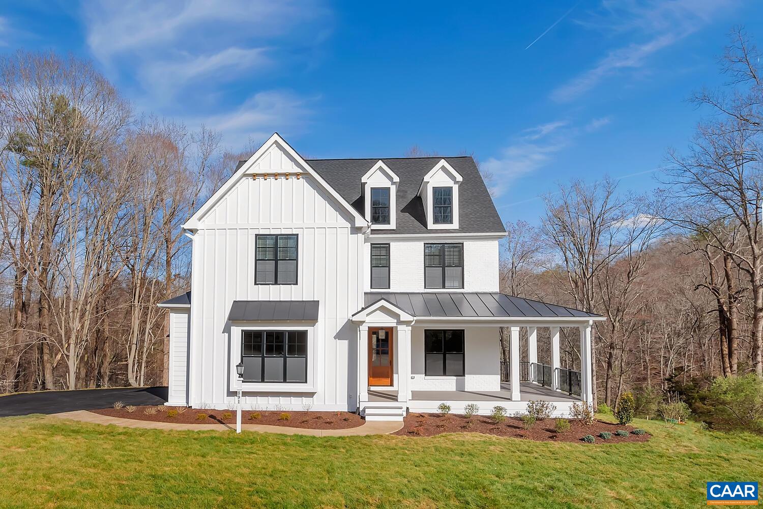 The desirable Mechum plan blends luxury design, quality craftsmanship, and modern living! Set on a scenic 1-acre homesite with breathtaking mountain views, this home offers the perfect balance of comfort and function. The light-filled main level features a private study and an open-concept great room. The gourmet kitchen and spacious dining room extension are ideal for both entertaining and everyday living. Upstairs, a private Primary Suite, oversized Laundry room and 3 Bedrooms with 3 Bathrooms (one a J&J concept) ensure a space for everyone to enjoy. A finished 3rd Floor Loft offers an extended, light filled area to enjoy. High-quality finishes include 2x6 exterior walls, a custom Mahogany front door, wood shelving throughout, and a zoned 15 SEER HVAC system. With public water and sewer, a 2-car side-load garage and easily accessible mechanicals, this home has so much to offer. Walkable to both Downtown Crozet and Old Trail, this rare opportunity offers the best of location and lifestyle. And with the ability to make interior selections alongside our talented Design Coordinator, you can truly design the dream home you've always wanted and move-in the Spring of 2026!