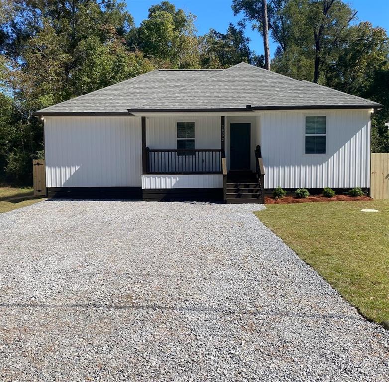 Beautiful New Construction. Move-in Ready! This home features a split floor plan with 3 bedroom 2 bath and no carpet floors.  There is a nice sized dining room attached to the kitchen. The Kitchen has granite counter tops, SS appliances, a pantry and a bar.  The primary bedroom has a large bathroom with double sinks, bathtub, shower and large walk-in closet with shelves.  The living room has a back door that leads to a private covered gravel patio area with a fenced back yard.