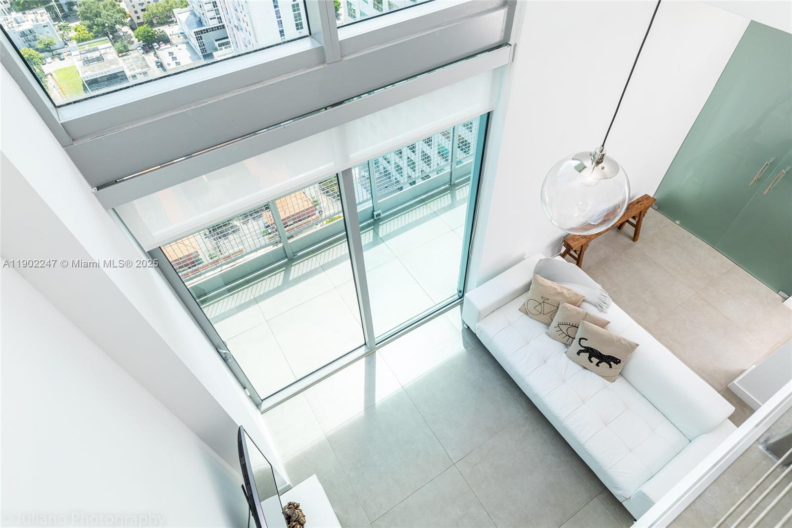 WOW! AMAZING! A unique 3 bedrooms 2 baths TWO FLOORS PENTHOUSE LOFT double height 20 foot high ceiling at the only industrial LOFT BUILDING in the Brickell area. This property was completely remodeled in a immaculate condition with beautiful finishes and an amazing view of the city and the ocean. Only a Block Away From Brickell City Centre. Really well priced! COMES WITH 2 PARKING SPACES 1 ASSIGNED AND 1 WITH VALET  NO PETS ALLOWED