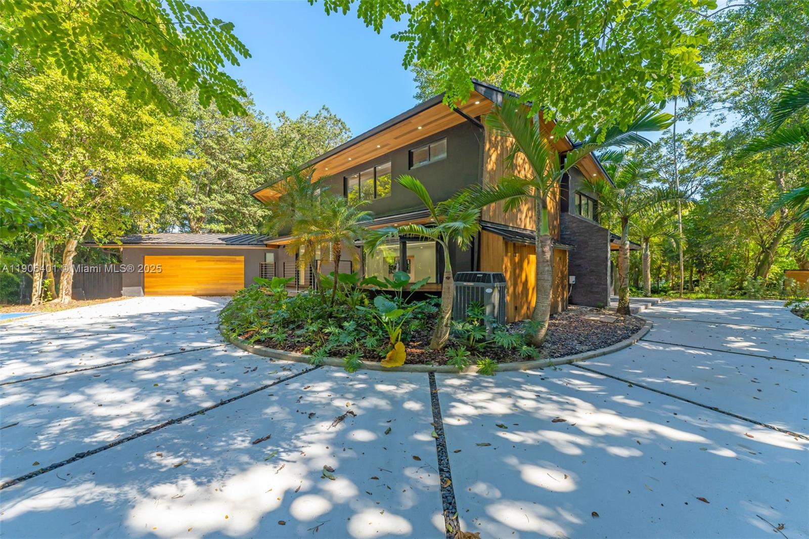 Luxury meets design in this stunning Mid-Century Modern home located in Pinecrest’s exclusive Devonwood community. Offering 4 bedrooms, 3 baths, and 4,480 SF of bright open living space, this architectural gem features vaulted ceilings, elegant natural finishes, and expansive floor-to-ceiling windows that fill the home with natural light. Enjoy resort-style outdoor living with a sparkling private pool, lush tropical landscaping, and a spacious patio ideal for entertaining or relaxing. Set on a 26,489 SF lot, the property provides exceptional privacy and endless potential to customize or expand. Perfectly positioned minutes from top-rated Pinecrest schools, fine dining, and boutique shopping, this residence defines luxury living in one of South Florida’s most sought-after neighborhoods.