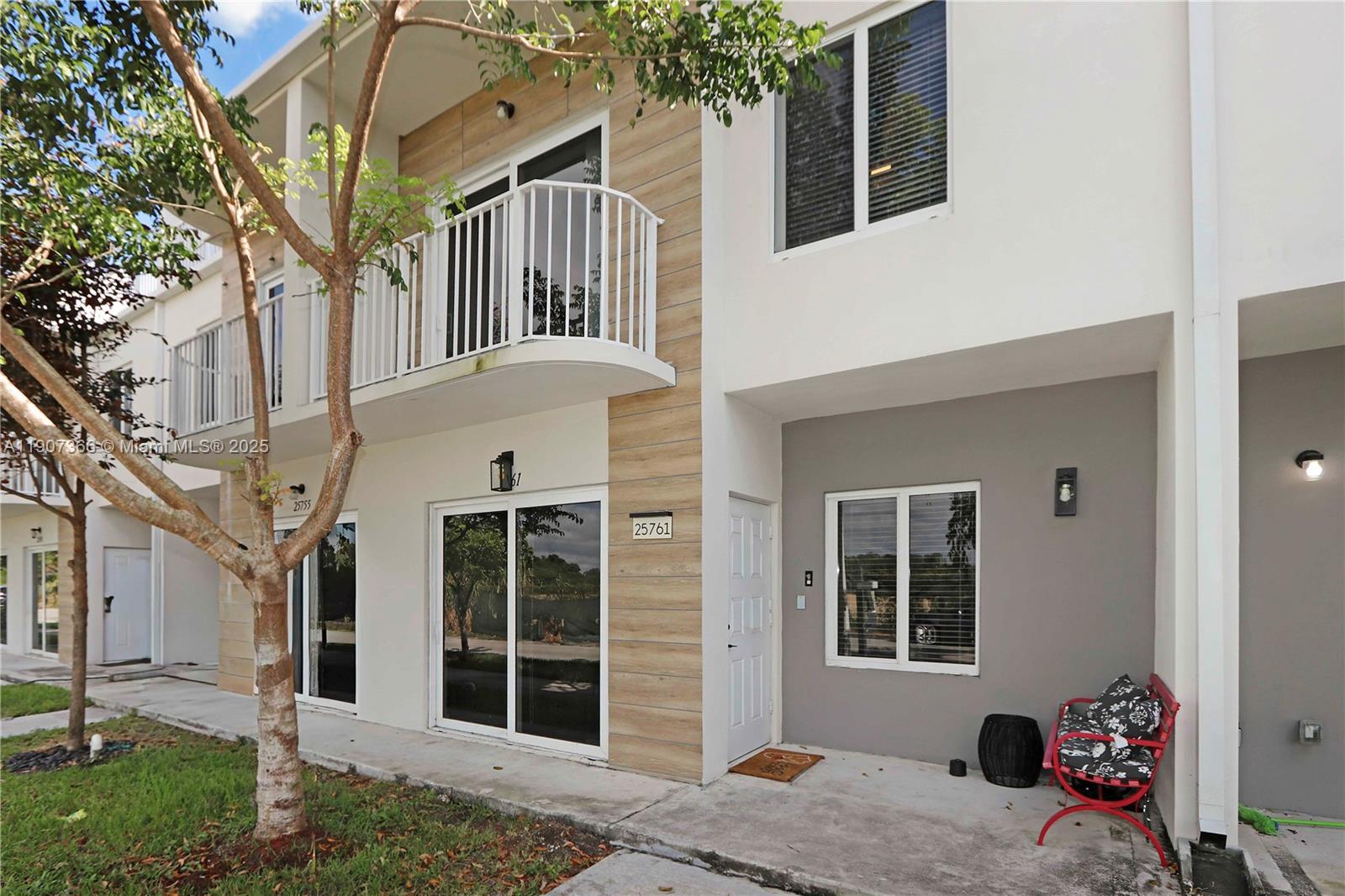 Modern 2021-built townhouse featuring 4 bedrooms, 3.5 baths, and a stunning rooftop skyview terrace. The first-floor bedroom with a private entrance can serve as an in-law suite or efficiency for extra income. Enjoy impact windows & doors, elegant porcelain tile throughout, and a sleek open kitchen with stainless steel appliances, quartz countertops, and upgraded cabinetry with moldings. The owner’s suite boasts a custom-built walk-in closet. The second floor offers another spacious master with walk-in, plus washer & dryer included. Additional highlights: tankless water heater, private balcony, and a large rooftop terrace perfect for entertaining. FHA approved, low HOA, no CDD, and pet-friendly community with easy access to Turnpike and US1.