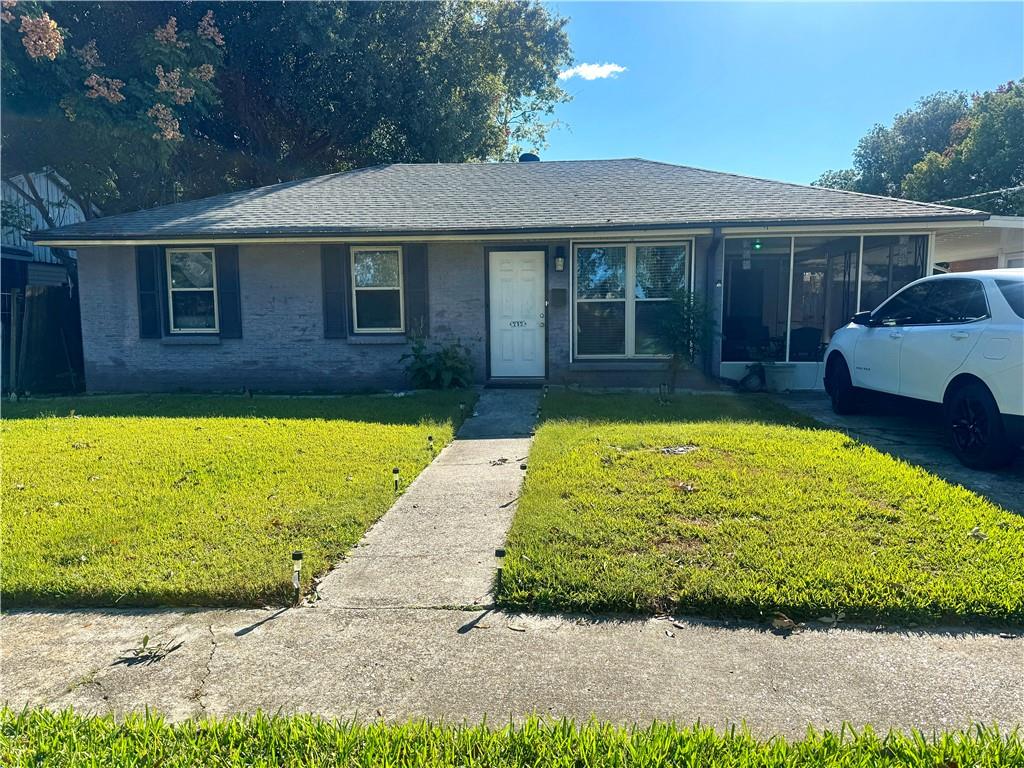 This property is great for investors or owner occupied buyers! Two bedrooms, one very large, and one bath with an open concept living and kitchen make this home feel much larger than it actually is. Relax on the comfortable screened in porch.  Enjoy pulling directly under the carport and entering through the side door of the home into the kitchen. The back yard is huge with plenty of space for whatever you like! Keep those insurance costs low with a newer roof, AC, and water heater.