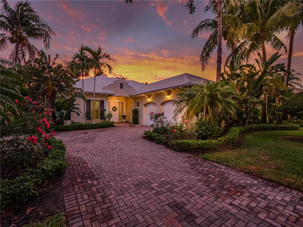 Antilles Captivating Charm ~ Stunning Home boasts a sprawling layout, Impact windows, Volume ceilings, Grand Kitchen & Family Rm, Formal Dining, Tile & Recessed Lighting thru-out, A/C 2023 w/ lifetime warranty, WH 2022, Central Vac, New fixtures, H/H Walk-in Closets, Relax & Enjoy your Evenings on your Spacious lit Patio w/ Firepit.