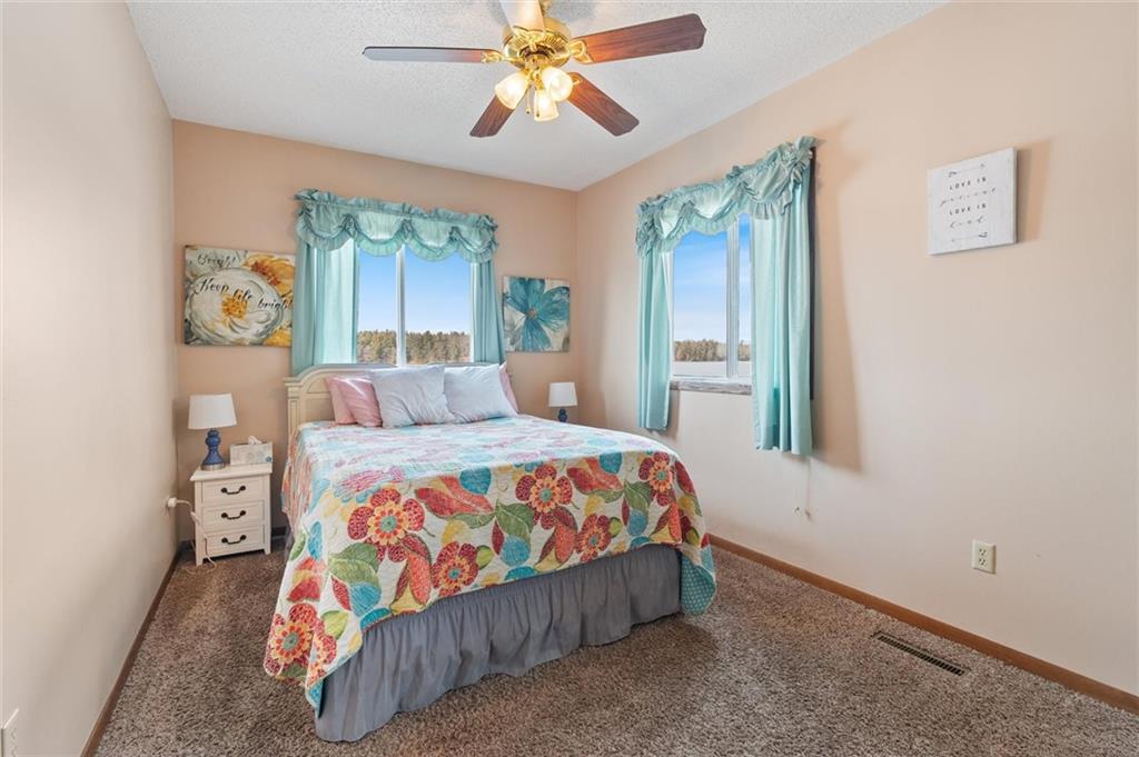 Main floor bedroom with walk-in closet