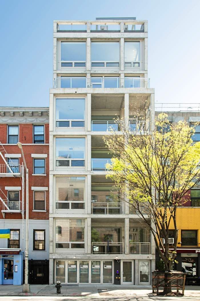 Loft Building with Elevator on Prime East Village Block

Presenting 180 Second Avenue, a newly constructed 7 story loft building located on a prime East Village block, between East 11th and East 12th Streets.  Built on the footprint of a former Polish-American social club, this 25 foot wide elevatored building makes a striking modernist statement, with its mid-century inspired concrete frame and open loggias floating above a historic stretch of Second Avenue. The building's design reflects a commitment to sustainability, and each of the residences is constructed to conform to Passive House standards, while the bulkhead is designed to accept solar panels for water heating. Environmentally friendly features include European triple-pane windows, energy-saving airtight interiors built to prevent mold and condensation, advanced air filtration and high-performance ventilation with individual ducts for each residence.

The entire 10,500 +/- sf (approx.) building is being delivered as a "white box", with all major structural, electrical, plumbing, hvac and mechanical elements in place, including a new high speed elevator with virtual doorman.  The finishes, including all appliances, fixtures and flooring are being left for the buyer to complete according to their requirements.  

180 Second Avenue presents a compelling opportunity with three potential end uses:

—All or part of the residential portion of the building could be owner-occupied, with the remainder rented for income;
—As an attractive income-generating asset, by renting out the entire building;
—As a development project, by filing for conversion to a mixed use condominium with commercial on the ground floor and 6 residential units above (subject to the necessary approvals).

As currently configured, the building consists of a ground floor commercial space (under lease to an established restaurant/bar operator, expected to take possession in 2024), four vacant full floor 2 bedroom/2 bath apartments, one full floor 1 bedroom/2 bath apartment and a loft-like studio space with full bath on the top floor.  Each of the residences boasts at least one private outdoor space, affording stunning views of the city or of the tree-filled courtyard in back.   A generous garden adjoining the commercial space and a spacious roof terrace with open city views all the way to the art deco towers of Union Square and the Chrysler building complete this offering.

A description of each of the floors follows:
Ground Floor Plus Cellar
Currently under lease to an established local restaurant/bar operator with possession expected to occur in 2024. The lease term is approximately 9 years.  The ground floor includes access to a 25' by 34' private walled garden.  The cellar below this floor is dedicated to prep areas, storage, 2 powder rooms and mechanicals. 

Floors 2-5
Each of these identically configured floors consists of a full floor loft with two bedrooms and two full bathrooms, as well as a spacious open loggia and glass-enclosed solarium with views to the West, North and South.  

Floor 6
This floor consists of a full floor 1 bedroom/2 bathroom apartment with terraces on both the West and East sides.

Floor 7
This floor consists of a loft-like space with a full bathroom and kitchenette; it could be used in combination with the floor below as a home office, creative space or as an additional residence.

Roof
The roof consists of a generous paver-lined terrace with extraordinary views in all directions.  The roof also contains a bulkhead for the elevator, stairwell and mechanicals; the bulkhead is designed to accept solar panels for water heating purposes.