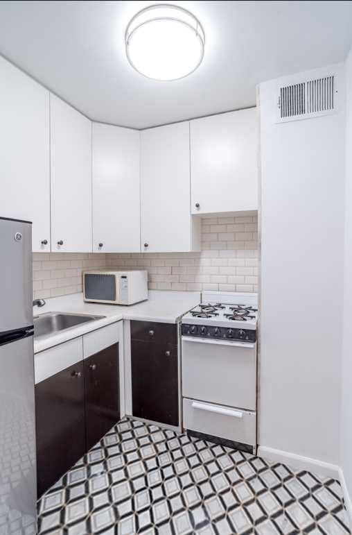 153 E 57TH Street, New York, NY 10022, 3 Rooms Rooms,1 BathroomBathrooms,Residential,For Sale,GOTHAM TOWNE HOUSE,57TH,RPLU-810123092076