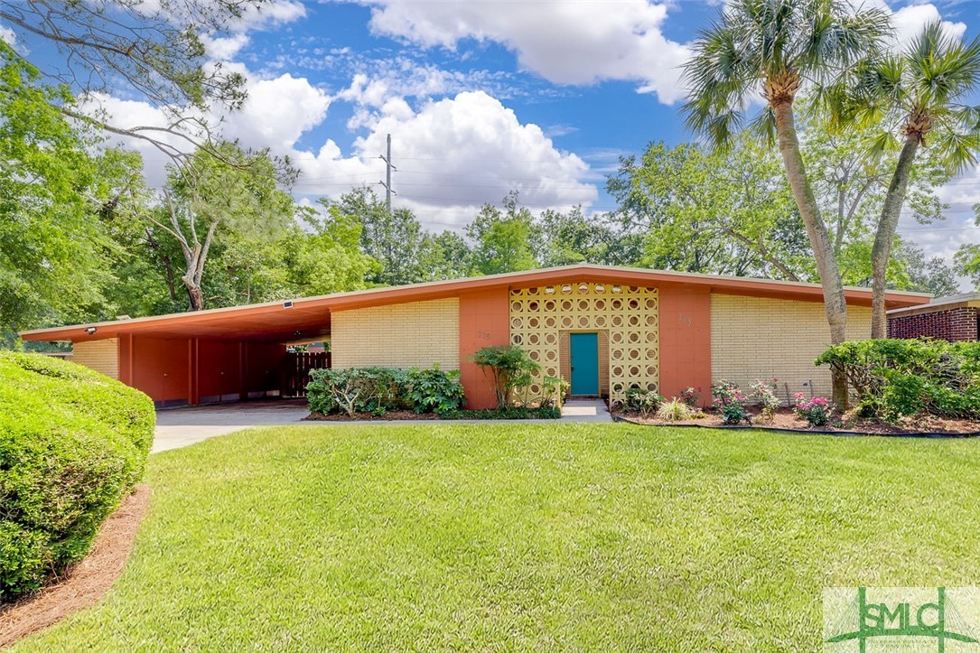 Presenting an exquisite Mid Century gem, meticulously crafted by Architect Stephen P. Bond in 1958. This dwelling embodies iconic hallmarks—shallow gabled roof, beach block exterior, and breeze block atrium entry. Step inside to discover the essence of Wright's design philosophy—compression and release—manifested in sloped ceilings, open atriums, and clever spatial arrangements. Original details abound, from custom built-in cabinets with atomic chrome knobs to period bath tile and fixtures. Impeccably preserved, this piece of Americana offers a glimpse into a bygone era. Situated within walking distance to Habersham Village, it seamlessly integrates architectural brilliance with community convenience.