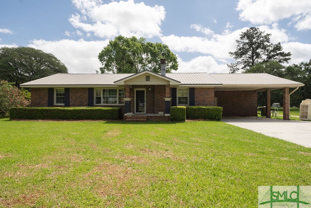 Welcome home to 244 Raymond Rd! Located on the outskirts of Pooler, 15 min from downtown, The Port, Gulfstream, close to Savannah Christian Preparatory School & minutes from I16! This renovated full brick home is situated on 1.58 ac!! NO HOA!! This well maintained hidden gem boasts a shop, tons of outdoor entertainment space AND a power pole at the rear of the lot for a camper hook up!! The home has Granite counter tops, oversized Island & updated cabinets in the Gourmet Kitchen. The Owners suite is tucked privately away from the rest of the house & has an ensuite bathroom. The Open Concept layout is perfect for family gatherings! The kitchen, Dining Area opens into the great room with a large wood burning fireplace. The utility room off the back of the car port gives amazing storage potential. This home has endless possibilities! The acreage gives you room for more outbuildings or a pool!!  Don't miss out on this custom home located in the perfect location to be close to everything!