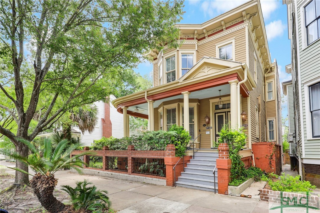 What a special condo in Historic Savannah. Upper unit in this beautiful Victorian lady. Wrap around front porch with a communal side yard for relaxing. Hard to find outdoor space downtown! Steps to Forsythe Park. This special unit has soaring ceilings, large living spaces, both LR and DR and a sweet back porch. Primary bedroom is on the front of the home with its own updated bathroom. The second bath is just off the main hall so easily accessible from second bedroom or living area. Finished off with gorgeous crown molding, lots of natural light, three fireplaces and open concept. This unit has a deeded garage space located in a detached garage. Accessed from the lane with an automatic door or from the garden. Perfect for your car or additional storage. Grab a drink and relax on the porch, in the garden or make your way to Brighter Day for a sandwich. Then walk across the street and enjoy all the concerts or games in the park. Perfect location for a second home or make it your primary.