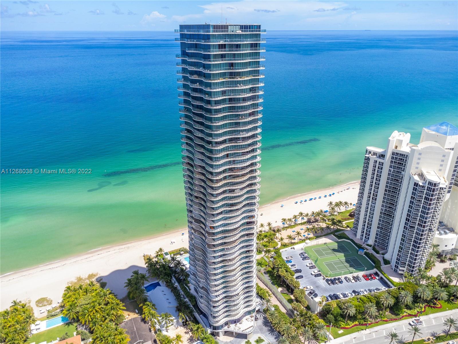 EAST, WEST, NORTH, SOUTH: Own Your 360-Degree Views. A private elevator takes you to your oceanfront home with about 5,000 SF living area and 2,210 SF wrap-around terrace with 150 steps of spectacular views all around. Price includes: tastefully designed by Trend Design with build-ins & Armani Casa furnishing, harmonious earth tones throughout all 4 BR & 5.5 BA. The expansive living and dining room is great for entertaining, while the master wing includes spa-like features his & hers. Ultra-high-end boutique condominium amenities include full service at beach/pool, pvt. wine cellar, state-of-the-art gym/spa & more! Go for a walk or jog without leaving your unit while overlooking the Atlantic Ocean, all of Golden Beach, the Intercoastal Waterways & skylines of Miami Beach.