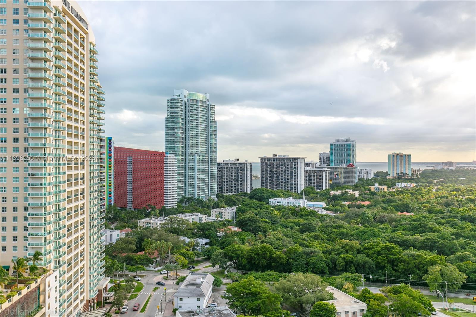 This stunning and spacious apartment boasts three bedrooms and two full and one-half bathrooms, combining elegance and coziness. Its floor-to-ceiling windows allow an abundance of natural light to fill the space, offering breathtaking views of the cityscape and bay. The primary suite is a tranquil haven, featuring an ensuite bathroom with a luxurious soaking tub, a separate shower, and a dual vanity sink. The second bedroom is generously sized, and its bathroom includes a convenient shower/tub combo. The kitchen is sleek and contemporary, complete with high-end appliances, custom cabinets, and a sizable island. Located in the vibrant Brickell neighborhood, this apartment serves as a serene retreat while immersing residents in the lively and dynamic community that surrounds them.