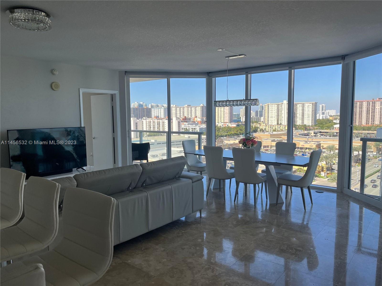 In the heart of Sunny Isles, enjoy resort-style living in large 2 bedroom/2 bath upgraded corner apartment with desirable north-west view of the ocean, intracoastal & city from wrap-around terrace & additional balcony. Freshly painted, marble floors, 3 new mattresses, tastefully redecorated with new appliances & furniture, fully equipped for family vacation. Resort-style amenities that include beach service, pool, fitness center, jacuzzi, pool cabanas, concierge, valet parking, kids room, 24 hours security. Walking distance to restaurants, shopping, entertainment & public transportation. Minutes to Aventura Mall, Gulfstream Casino and Bal Harbour Shops. STR- 02197.