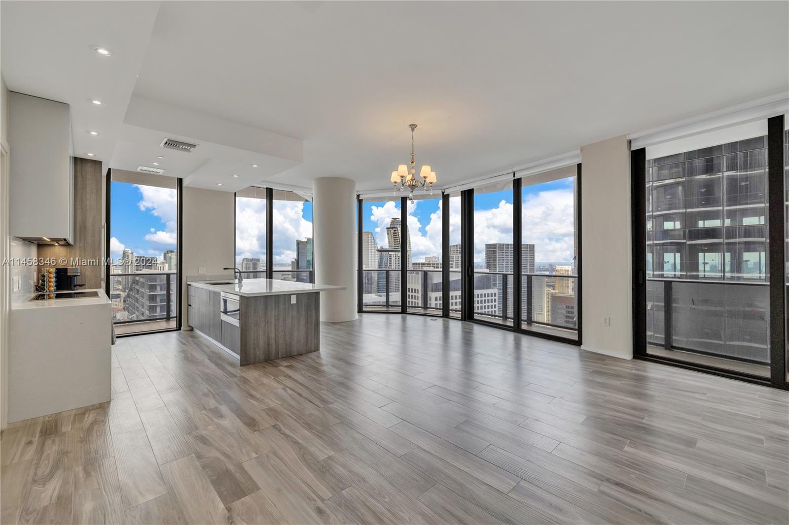 Biggest entertainment space in the 05 line! Previous owner has converted the unit from a 2br/2ba to a 1br/2ba to make the living room bigger. Can be easily converted back to 2/2 by buyer if they would like. Welcome to corner unit 5205 at the exclusive SLS LUX. This unit is located on one of the top floors in the building, with northeast views, Having the most incredible bay and city views throughout the day & night! This corner unit boasts a wrap around balcony with access from all rooms, floor to ceiling glass windows throughout with electric blinds, 10ft ceilings, upgraded Italian kitchen with oversized quartz island, top of the line appliances, private elevator & foyer.