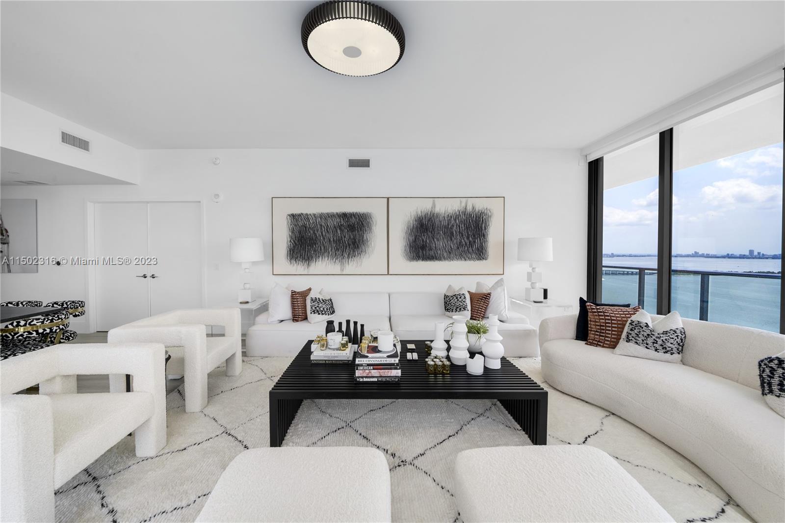 Edgewater’s most exclusive boutique development. 96 Residences with half and full floor flow-through units only! Presenting the premier SE corner floor plan with direct open bayfront views and incredible natural sunlight. 4 Bedrooms + Den/Office with endless water views facing Miami Beach & Downtown and city views of Edgewater and Wynwood. 10 ft. floor to ceiling glass windows, Wolf gas range and Subzero appliances, ceramic-wood flooring, & private elevator foyer. Lobby, 30th flr. owner’s Sky Lounge and residential common areas designed by renowned designer Jean-Louis Denoit. Other amenities include fitness center, spa, two pools, & five-star concierge services.