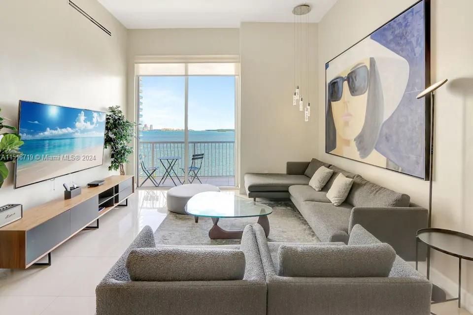 Welcome to your dream investment Airbnb approved condo with unparalleled Bay views! This meticulously remodeled unit offers a perfect blend of luxury, flexibility, and income potential.
This unit features higher ceilings than the units on other floors, providing an airy and bright atmosphere throughout. 
A standout feature in comparison to other units is the significantly larger balcony. Whether you're looking for a peaceful retreat or an ideal space for entertaining, this expansive outdoor area provides the perfect setting.
For investors seeking a larger residence, the chance to purchase this unit together with a 2-bedroom unit in the building provides an amazing opportunity to create a spacious 5-bedroom investment condo.