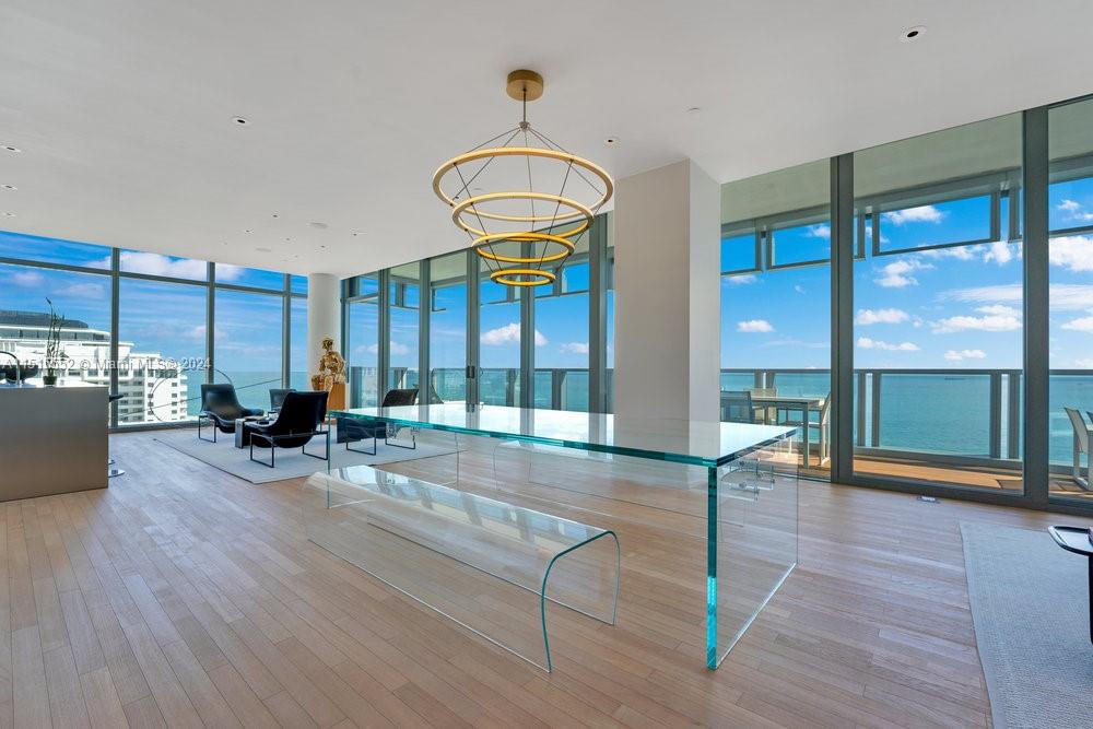 Ian Schrager presents this spectacular fully finished 4 bedroom 4.5 bath ocean-front residence designed by John Pawson & Suzanne Lovell Inc. This limited one-of-a-kind residence is located between the ocean and bay with breathtaking views of each. From the front door, the space opens up onto the Great Room, which offers unobstructed ocean views and full terrace access. The Living Room and Lounge Areas anchor the space with ample seating, and the clean and contemporary details of the sound system conceal or reveal the technology behind. A full bar is discretely organized behind millwork in the Entry Foyer and offers bar seating with a lavish space for entertaining. Enjoy 24-hour five-star world class service and amenities, poolside cabanas, resident-only beach club, and more.