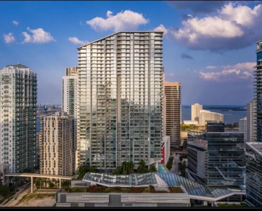 Live at prestigious Reach at Brickell City Centre ;Enjoy breathtaking views to the city and the Miami River. This spacious corner unit (1,265 sq f. plus terrace) features 2 bedrooms, 2.5 bathrooms,split bedrooms. Italian cabinetry and stainless appliances in the kitchen, quartz countertop, marble floors and state of the art bathrooms. Great amenities include fitness center, onsite personal trainer, children's playground, resident café & library, BBQ grills, heated pools & spa. Walk to area restaurants in the heart of Brickell.