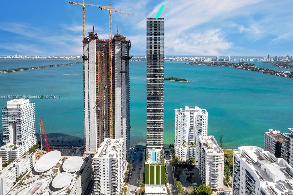 Impeccable waterfront sky residence 3 Beds plus Den, 4.5 Baths at Elysee, Miami’s newest & only luxury boutique building in Edgewater w/ only 2 residences per floor. Oversized living room w/ floor-to-ceiling windows overlooking Biscayne Bay + private sunrise & sunset terraces. Unit is completely finished w/ approx. $225K in upgrades, motorized shades, build in closets, wine cooler and addition of a large den + assigned storage space. Subzero & Wolf appliances, including Gas cooktop. ITALKRAFT Italian cabinetry in kitchen & baths. 3 floors of full-service amenities including Sunrise & Sunset pools; waterfront Fitness Center & Spa; 30th-Floor Sky Level Library, Screening Room & Grand Dining Room, in addition to 2 Guest Suites & Butler Service. Property is sold with 1 year home warranty.