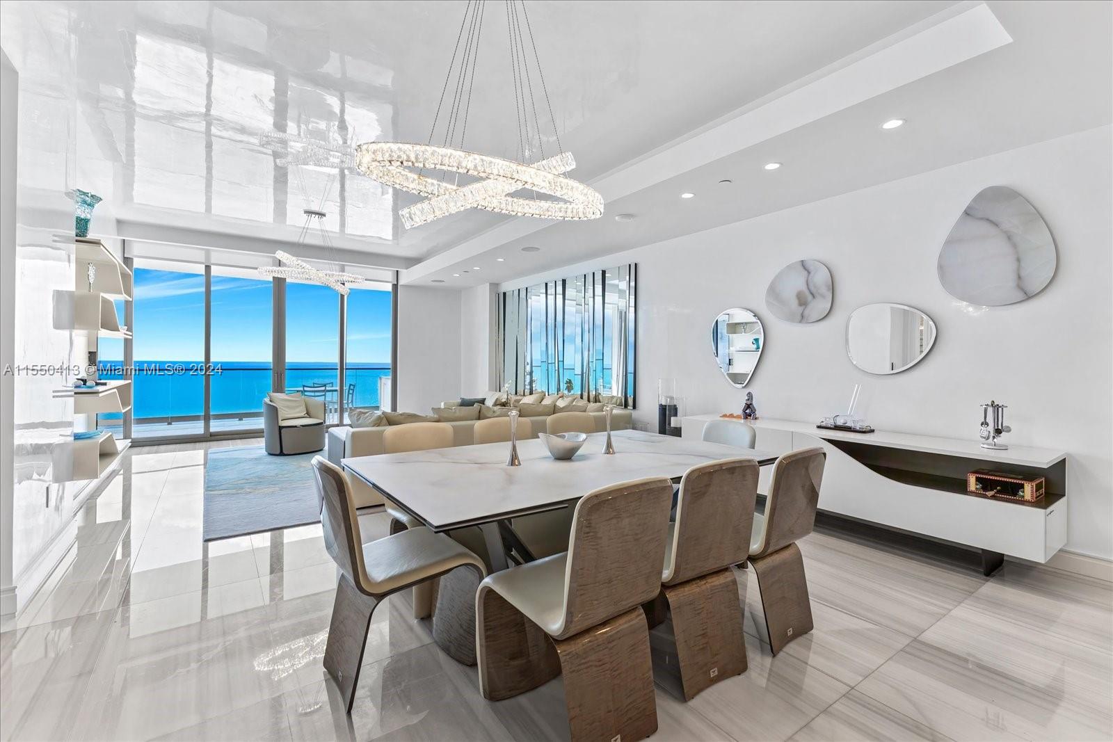 A beautiful flow through residence with incredible views and privacy. This 4 bedroom plus family room comes with home automation and beautiful selected finishes and upgrades.   Enjoy what the Five star, Five diamond Acqualina lifestyle has to offer and be amongst the selected few that get to call the Estates at Acqualina home! This residence comes fully furnished. The Estates at Acqualina has World-Class amenities including concierge service, a Rolls Royce house car, a beautiful large gym, daily breakfast, cinema, bowling, ice skating, F1 and golf simulators and children rooms along with three pools and 5 restaurants: Avra, KeUH, Il Mulino, Pool and Beach service and In Roon dinning.