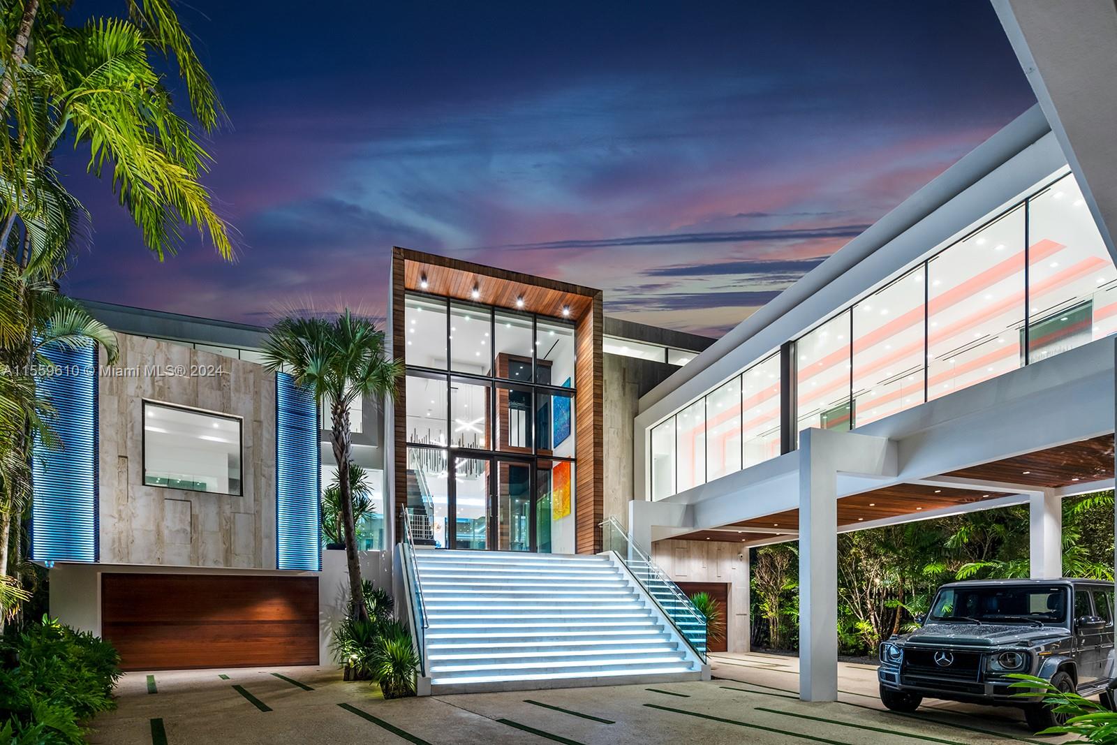 Stunning Bay/Canal Contemporary Residence- 100+ ft on deep water - New Construction (total of 12,200 SF under A/C).  Loaded with ultra luxury finishes and very little use - 35KM solar electric generator w/six Tesla power walls & Travertine exterior walls.  All custom lighting & sound throughout.  Unique glass elevator to all three levels.  Generous sized rooms and large closets.  Art Gallery, Office-Library, amazing 12 car garage, play room & wine cellar.  Breathtaking views of the Open Bay, City lights and tropical gardens from all rooms.  Huge covered Patio + Summer Kitchen w/50ft infinity edge pool.  Full dock & Boat Lift. Double gated 24/7 Island in the heart of Miami.  Minutes to Design District, Beaches, Downtown Miami & Bal Harbour.  Owner Financing Available.