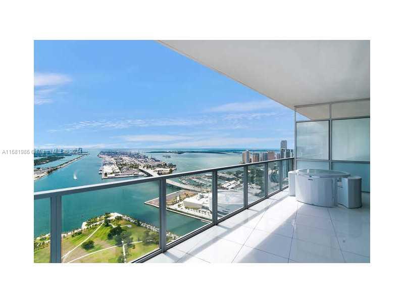 Indulge in luxury living at one of Miami's finest buildings with breathtaking views of Miami Beach, Biscayne Bay, and passing cruises. This professionally decorated unit by Artefacto boasts porcelain tile flooring and a private elevator for seamless access. Situated within a 5-star hotel, residents enjoy top-notch amenities and services, elevating the living experience to unparalleled levels of sophistication and convenience.