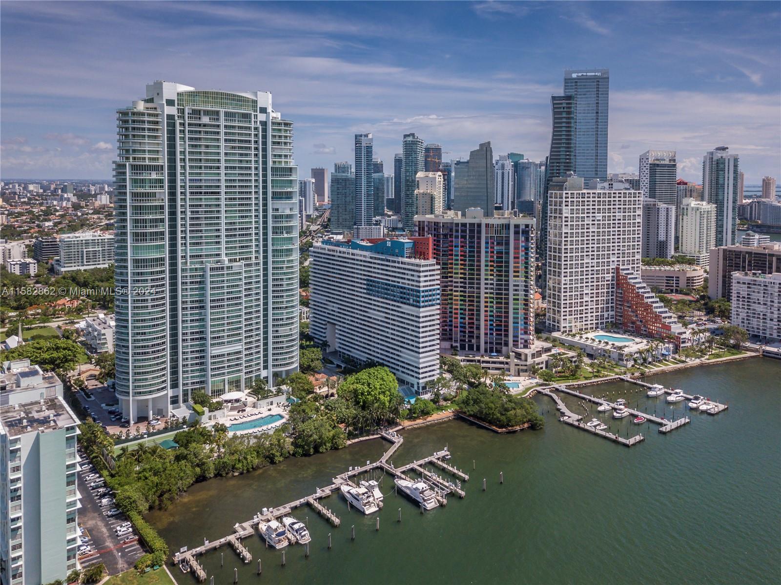 Exclusive and iconic residence at La Santa Maria. This oversized 4 beds / 4.5 baths features 4,030 sqft + 1020 sqft of expansive terraces with unobstructed views of the Ocean, Biscayne Bay and Miami Skyline. Flow-through unit features ample living areas with large living room, dining room, family room, and nanny's quarters. Amenities include new state of the art fitness center, marina, tennis court, pool, spa, kids forest & playground, and 24-hour concierge. This one of a kind residence was featured in Florida Design magazine for its flawless beauty and contemporary elegance.