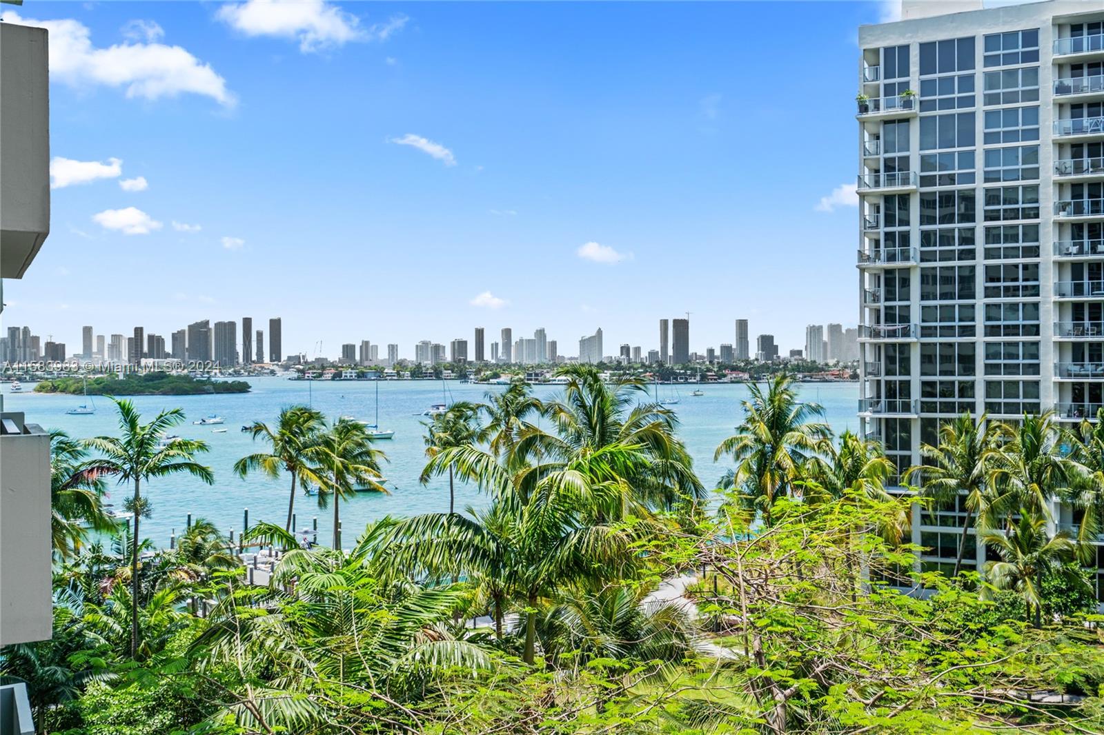 Experience modern luxury at The Flamingo in South Beach. This bright and airy 2-bed, 2-bath condo with wood floors and a kitchen bar was recently remodeled with upscale finishes. Enjoy resort-style living with pools, spas, and monthly rentals up to 12 times a year, plus a rare parking spot. Work from home on the balcony with bay views, and indulge in the 17-acre complex's lush gardens, bayfront pools, sandy beach, and Jacuzzi. Stay active with a fitness center, spa, and bay walk. Walking distance to Lincoln Road and the beach, this resort-style building features an infinity pool, spa, restaurant, and dog park.