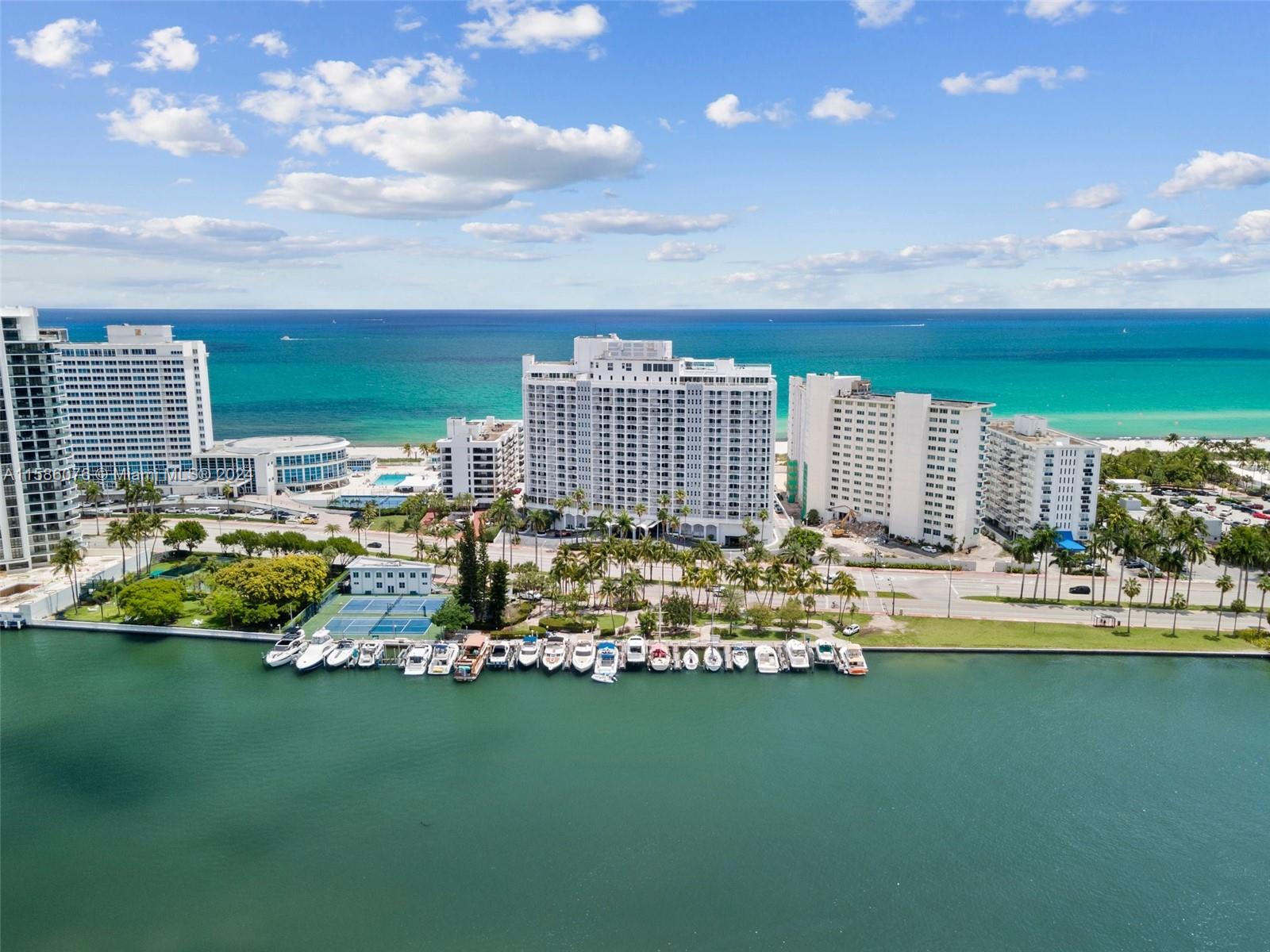 Experience elevated living by the beach in this stunning oceanfront condo. Boasting two spacious bedrooms and two full bathrooms, this beautifully appointed residence awaits you, promising a lifestyle of beachfront bliss. Located within the prestigious Carriage House condominium, enjoy luxury amenities such as an Olympic pool, oceanfront gym, tennis and racketball courts, direct beach access, and more. The apartment features modern conveniences including a washer and dryer, along with a generously sized balcony offering breathtaking ocean views. Monthly maintenance fees cover electricity, basic cable, water, and all amenities. Situated in a highly sought-after school district, this 15th-floor apartment also includes one covered parking space with additional parking available.