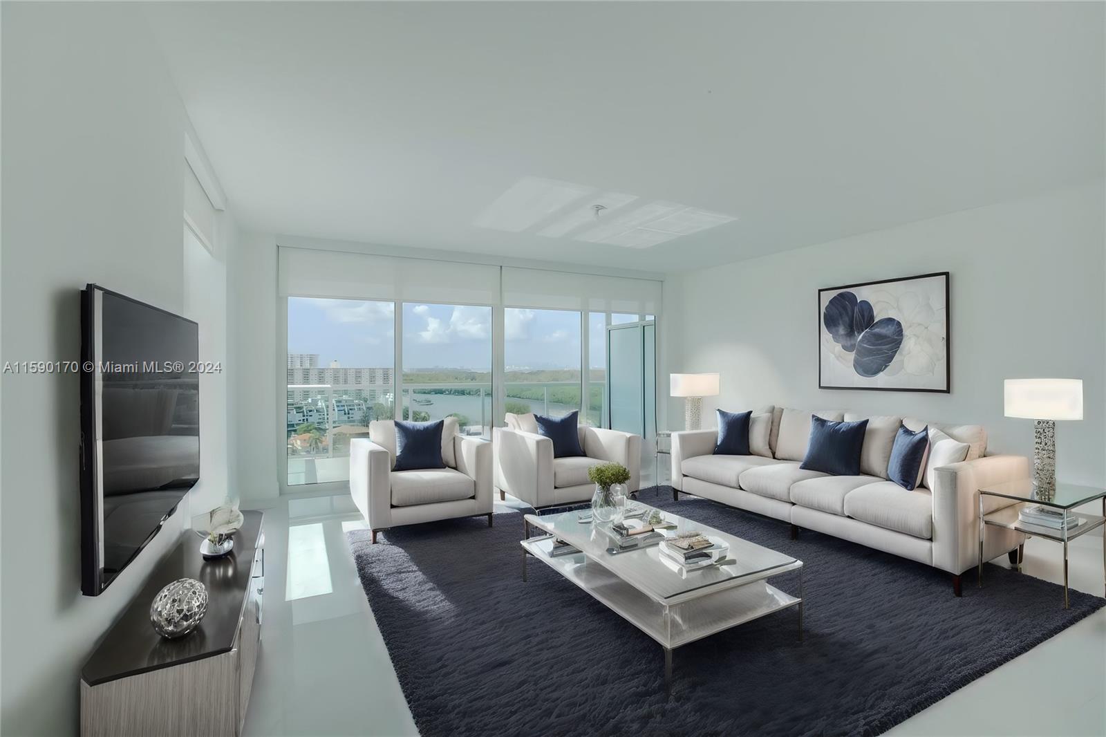 Stunning EAST CORNER UNIT  with panoramic water views! This magnificent 3-bedroom, 3-bathroom residence at the prestigious 400 Sunny Isles offers a high-tech kitchen featuring European appliances, beautiful white porcelain tiles throughout, and floor-to-ceiling impact windows that showcase the breathtaking views. 400 Sunny Isles provides resort-style amenities including an infinity pool overlooking the bay, a pool bar, a state-of-the-art fitness center, a spa complete with a sauna and steam room, a jacuzzi, tennis courts, cabanas, full-time concierge services, dry and wet marinas, a business center, meeting rooms, and assigned parking. With its prime location, this residence is within walking distance of the beach. A MUST SEE! ASK FOR THE VIDEO TO PREVIEW THIS GORGEOUS CORNER UNIT!