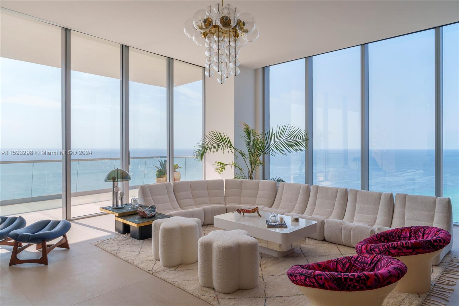 A space where nature, culture & modern architecture collide amidst the untamed allure of Miami. A southeast corner unit on the 42nd floor with sunrise & sunset terraces and unobstructed ocean views - this immaculate unit exudes a coastal vibe featuring stone & oak floors, an open dining area chef’s kitchen and 13.3-ft ceilings. Designed with both function & style in mind, the kitchen offers custom jade countertops and Snaidero cabinetry, Miele, Viking & True appliances. The light-filled space wrapped in glass accesses the oceanside terrace for indooroutdoor living. A secluded principal suite provides an ocean-view escape, custom walk-in closets & spa bathroom. 3 additional bedrooms & en-suite bathrooms offer a private respite to enjoy peaceful bayside terraces.