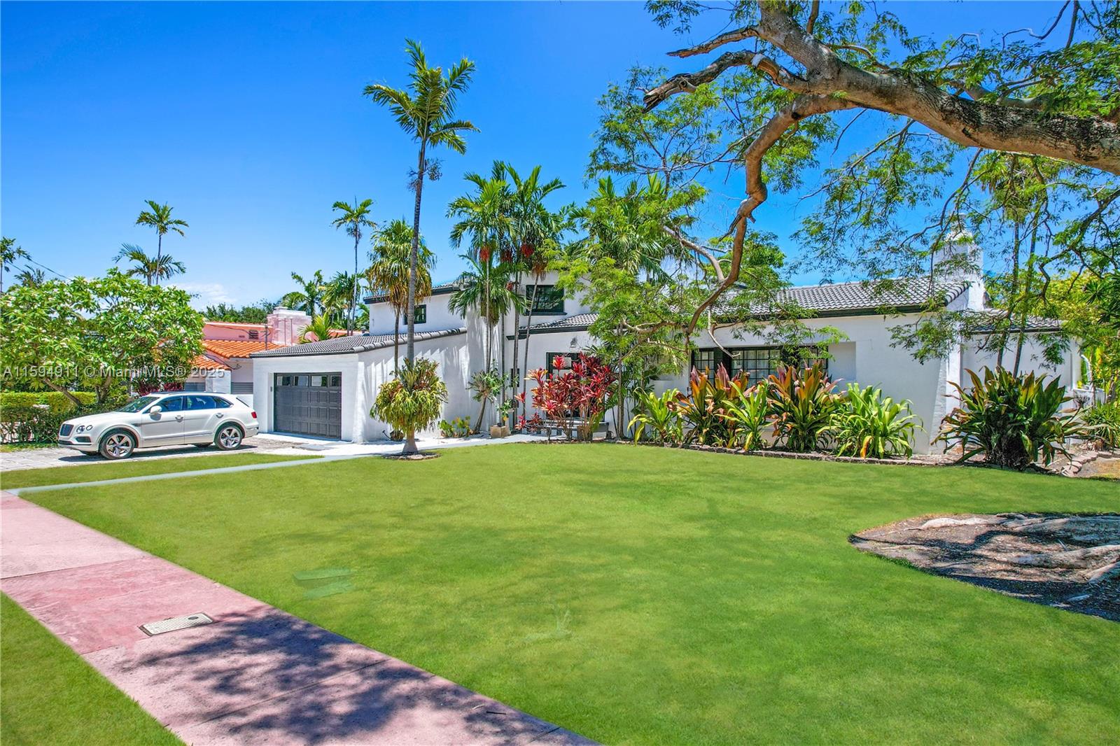 Iconic 1934 Villa designed by the famous Architect Carlos B. Shoeppi. Double lot living sqft of 4,339 well situated in the heart of Miami Beach within La Gorce Golf club. Property that has been meticulously renovated to the highest standards of luxury living. This beautiful property has been fully restored inside and out,  with new roof , new hurricane proof windows with UV protection, exquisite  kitchen with La CornuFé Range, Grande Carrera Marble, True Refrigerator, featuring Crystal chandeliers, Marble flooring, Hardwood floor. The property has pre-approved plans for 1000 sqft extension, Plans, Deposit paid for swimming pool will be be passed on to new owner at no extra cost.The home offer new roof, new hurricane proof windows with UV protection, 5 bedroom, pantry, guesthouse or office.