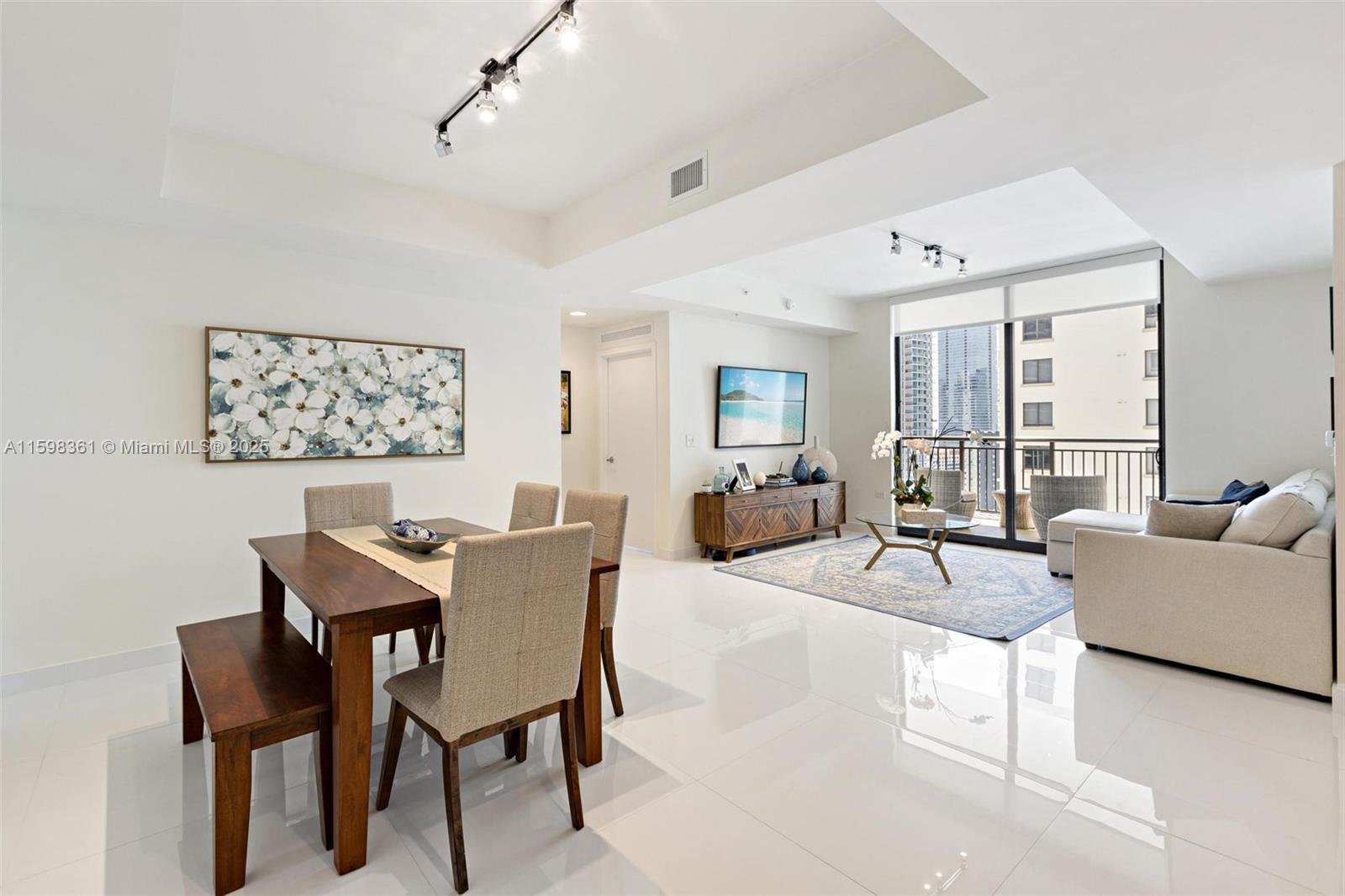 NOW PRICED to sell! Motivated Seller. Best line at the NINE in Mary Brickell Village. This is the largest 2 bed, 2 full bath layout at the NINE, updated with stunning 36 x 36 porcelain tile flooring throughout.  This apartment epitomizes modern living seamlessly blending convenience & comfort. This 1,384 sq ft apt on the 16 line is rarely on the market for the Brickell area. The 11th floor offers and array of amenities from pool & BBQ area to the child playground & the private party room. Stay active in the full gym. Convenience is the key at the NINE with a Publix supermarket on the 1st level and Metrorail station across the building. Explore many restaurant options & top shopping at Brickell City Centre just blocks away.