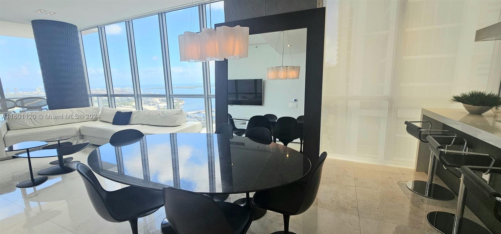 THE BEST VIEWS IN MIAMI! 2,106 Sqft, 43rd floor. Spectacular 3/2.5 corner unit with upgrades, gym, concierge, 24hr security and valet. Upgraded unit, private elevator finished w/ Italian wood panels Viking Appliances, white Marble floors, impact glass, walk-in custom closet. Views of Biscayne Bay, The Port of Miami, The Perez Art Museum, and much more. All amenities by ME Miami Hotel & Spa. Walk to sports arena & arts/entertainment. Call or text Listing agent for Showing 24 Hours’ notice. Minimum 750 credit score required by Marquis. Items Required for Offer - NO EXCEPTIONS credit report and score, Driver License or passport, 3 months of bank statements, reference letter from landlord & Tenant screening full report. HOA requires 1 Month rent Security Deposit to be Paid by Tenant.