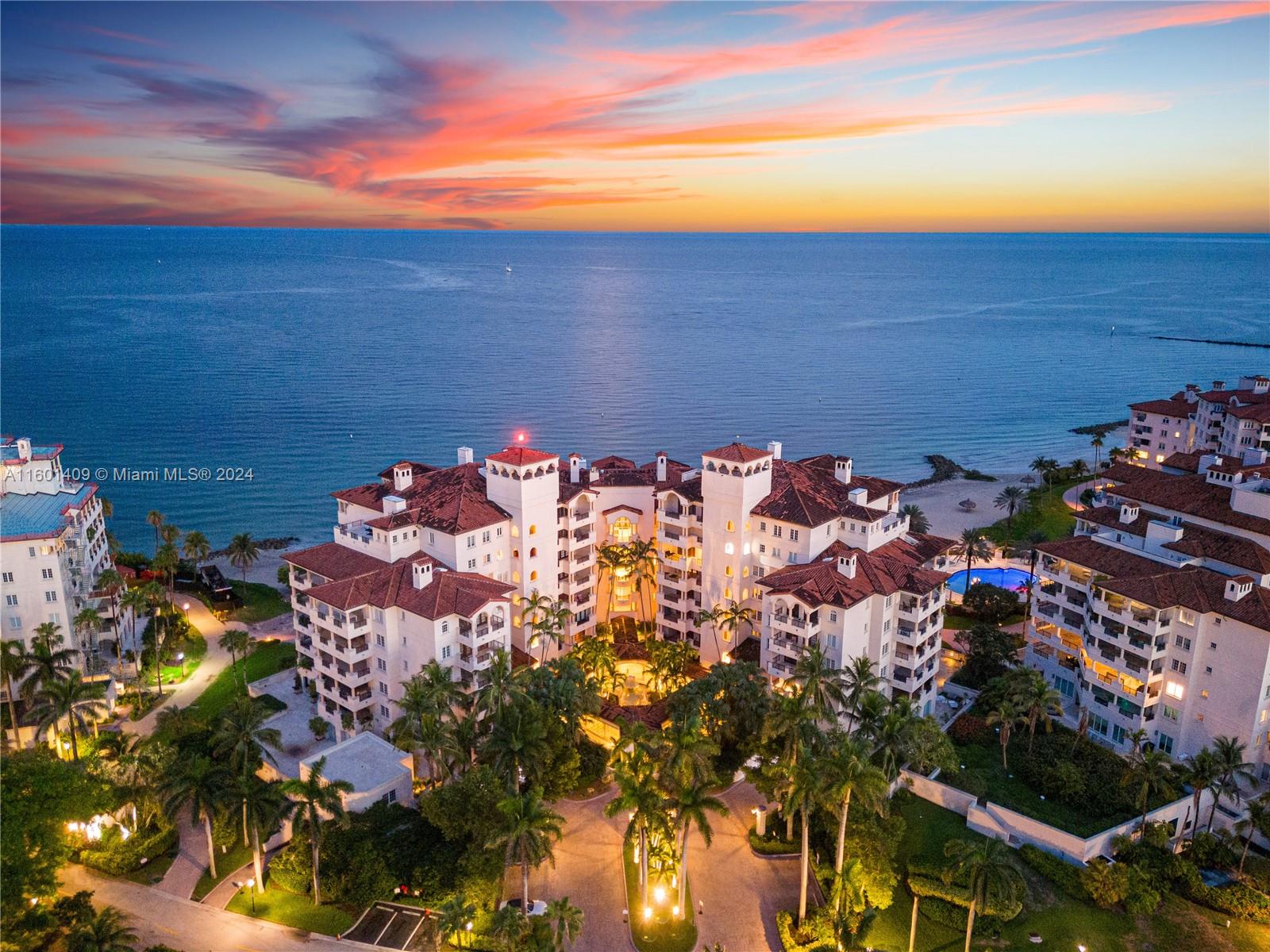 Luxurious Fisher Island living awaits! This rare two-story home offers nearly 6,268 sq. ft., with 5 beds and 6.5 baths, with direct oceanfront access. The first floor boasts a luxurious primary bedroom, complete with a private outdoor jacuzzi, cozy living room, den/office, and two bedrooms with ensuite baths. Upstairs, enjoy a gourmet kitchen, spacious living area, formal dining, and two additional bedrooms with en-suite baths. Expansive terraces provide an outdoor lanai entertainment deck and steps to the sand. Enjoy the convenience of 2 parking spots and 2 golf cart spots. Fisher Island's world-class amenities include a beach club, restaurants, racquet club, golf course, spa, gym, and day-school. Embrace unparalleled living with this extraordinary offering. Available now!