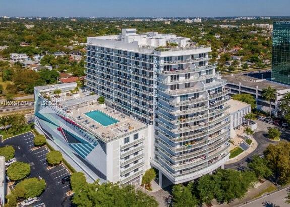 Experience modern Miami living in this spacious studio at Baltus House, a boutique building offering luxurious amenities and stunning Biscayne Bay views. The unit features floor-to-ceiling windows, stainless steel appliances, and an in-unit washer/dryer. Enjoy resort-style perks, including a pool, spa, sauna, rooftop terrace with BBQs, and an exercise room. With free guest parking, secure entry, and 24/7 security, your peace of mind is ensured. Located just blocks from I-95 and walking distance to the Miami Design District, Midtown, and Wynwood, with quick access to Miami Beach and Edgewater. Includes one assigned parking spot.