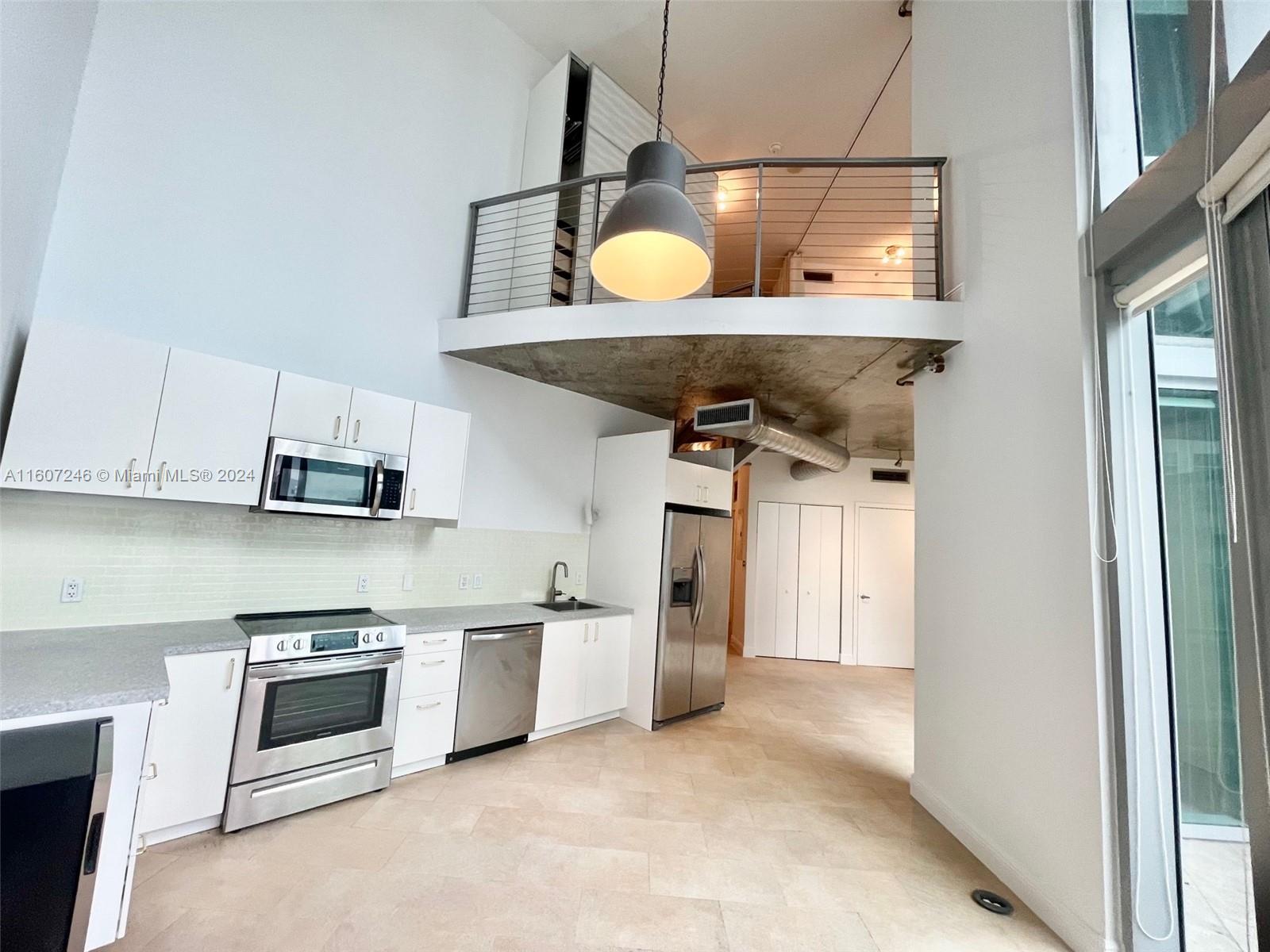 Motivated Seller. Best deal in Brickell!  Renovated, modern open concept 2/2 w/a stunning pool & city view. This 21st floor fully tiled unit features ample closet space & updated kitchen, baths, washer & dryer. Neo Vertika amenities include a resort style pool & hot tub, gym with sauna/steam room, basketball, racquetball court, boxing area, crossfit area, dojo, billiards, party room, kids playground, dog park & more. The Brickell building provides an urban living experience, situated a short distance to Brickell City Centre, & centrally located between Coconut Grove, Key Biscayne, Coral Gables, Miami airport, Downtown/Midtown/Wynwood/Design District, & Miami Beach. 2nd vehicle may be parked free w/ valet if have 2 registered residents.