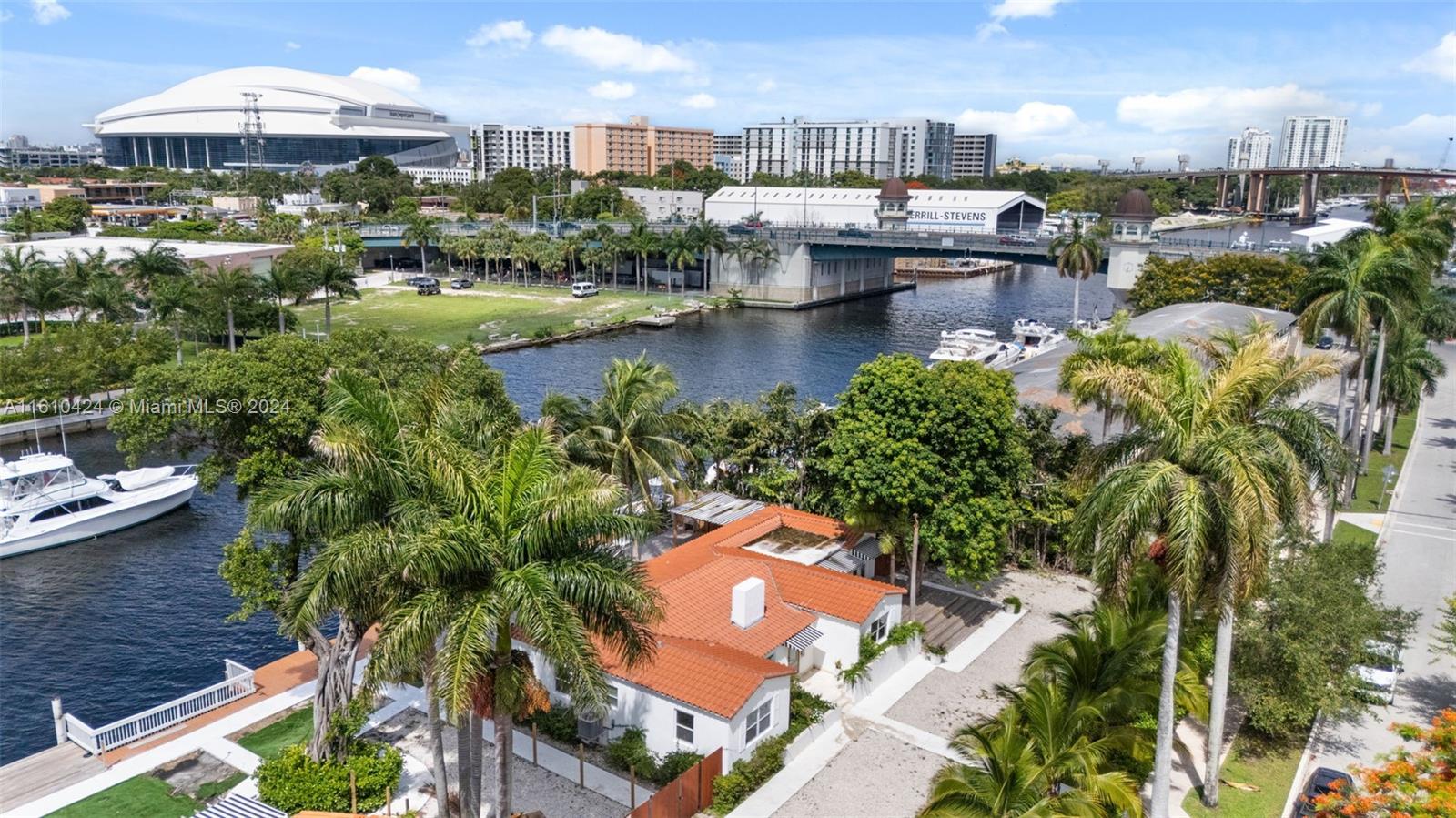 Deep, 96-foot River FRONTAGE! 2,195 sf water-front home. Totally renovated 2 years ago. Includes 4 beds / 3 baths. Lot size: 13,915 sf. Situated along the Miami River in the Spring Garden district (next to a neighborhood mini park). Interior features: high wood-beam ceilings, stone flooring, kitchen with center kitchen island, a dining area, living room, w/d, d/w, French doors that lead to the wooden deck & views of the 100-foot private dock. Driveway for 2/3 cars. Owner motivated! Vacant and ready to move in! Do Not Miss out on this unique opportunity! Boater's DREAM DOCK on the Miami River!