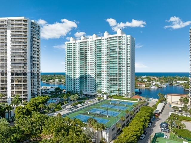 Experience luxury living at Hamptons South in the heart of Aventura! This exquisite 2-bedroom + den, 3.5-bathroom, 2980 SqFt property offers totally unobstructed views: ocean and intracoastal in the front, golf course, lake, and city in the back. The spacious den can be an office or family room. Enjoy the huge walk-in closets, large laundry room, and private elevator. Amenities include an infinity pool, 100-seat movie theater, BBQ area, tennis courts, internet café, kids room, and exclusive on-site restaurant. Only 5 minutes to the beach, with a 3.5-mile bike and walking path nearby. Easy to show. Call or text the listing agent.