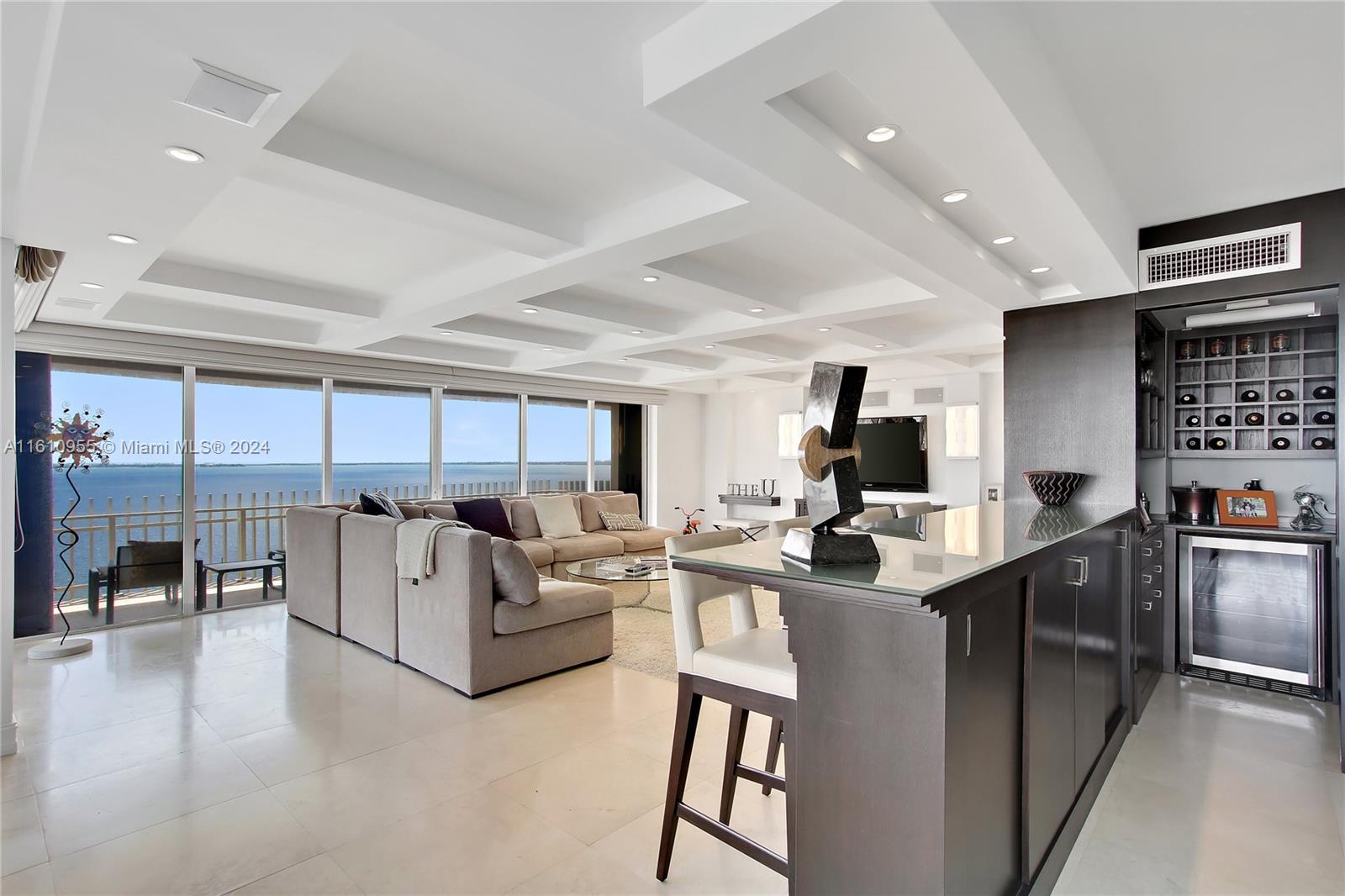 This beautiful 3 bedroom + den / 2.5 bath corner unit offers absolutely stunning views of the Miami Skyline, Key Biscayne, Miami Beach and more! Boasting over 2,600 sqft, this unit provides ample space for living and makes it the perfect spot for hosting. Key features of the unit include marble flooring, high end appliances throughout, floor-to-ceiling hurricane impact sliding doors, ample closet/storage space. The unit has been beautiful upgraded with no detail or expense spared. Located in the highly desired neighborhood of Grove Isle, don’t miss out on your chance with this spectacular property!