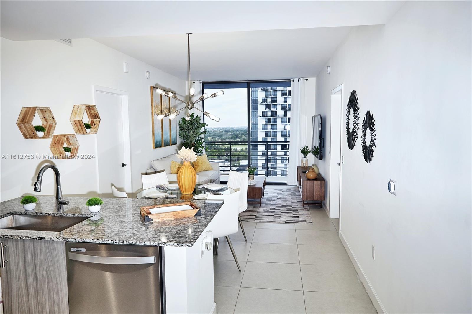 This beautiful 2/2 condo in the heart of the spectacular Downtown Doral, SOLD FULLY FURNISHED + INCLUDED STORAGE, has two separate entrances with the possibility of use as two units; perfect for short/long term rental with attractive income. It's a win win for either long or short term rental! Features stainless steel appliances, granite countertops, tile flooring throughout, full size W/D in the unit and. Building offers many amenities such as gym, pool, party room, spa, kids play room, working spaces, 24 concierge and valet parking. With amazing views of Downtown Doral, Golf course and walking distance to shopping centers, restaurants, supermarkets, parks, golf courses, business centers and public transportation.