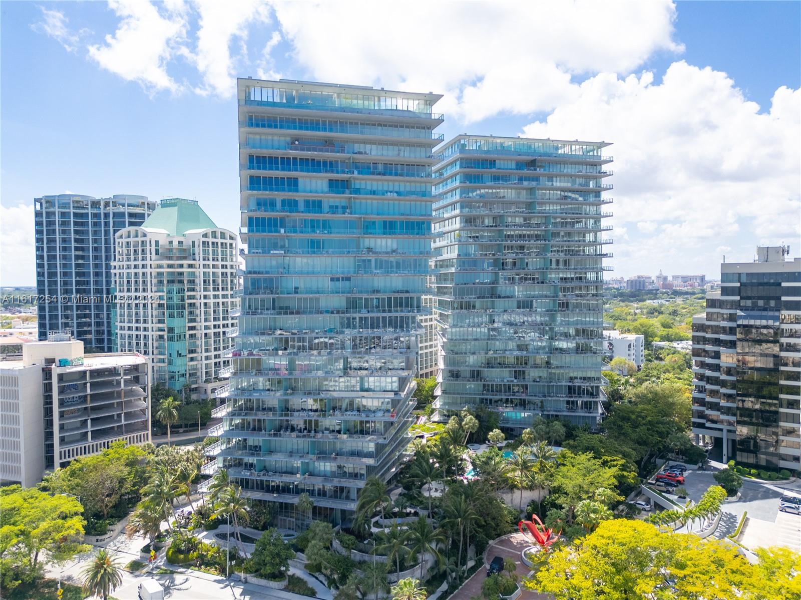 Most sought-after waterfront luxury condominium located in the heart of Coconut Grove with turn-key 4 bed 4 baths, fully furnished unit. Impressive floor to ceiling windows and an immense balcony to enjoy the direct view of the Biscayne Bay and breathtaking sunsets. Stately entryway welcomes you to the main floor of living with gourmet kitchen outfitted with top of the line appliances. Amenities include state of the art fitness center, spa, concierge, valet, butler service, roof top terrace and more.  This masterpiece resides in Grove at Grand Bay by architect Bjarke Engels.