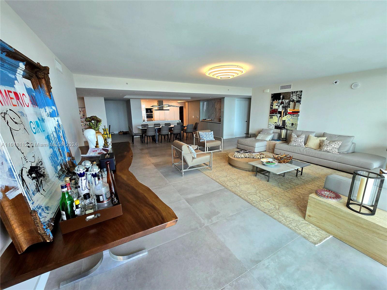 This impeccably furnished and decorated unit in Sunny Isles offers jaw-dropping waterfront views and is just steps from the beach. This residence includes 4 bedrooms, 4.5 bathrooms, a spacious family room, and a large terrace with incredible views. The unit features an open floor plan, porcelain tile flooring, floor-to-ceiling impact glass windows, a gourmet kitchen with quartz countertops, an induction stove, Wolf appliances, Italian cabinetry, electric blinds, and Ornare closets.

Premium amenities: 24/7 front desk/valet, 5 pools, movie theater, spa, gym, kids club, game room, playground, social room, and beach club. Located near the beach, Aventura Mall, and Bal Harbor Shops, with access to top-rated schools.