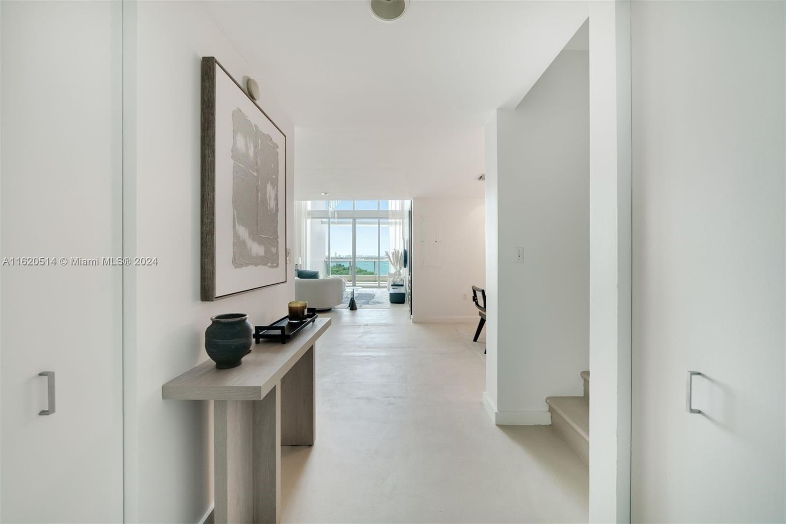 Captivating and Rare Sky-Home in the Heart of Miami! Indulge in the exclusivity of this light-filled two-story condo that present the ultimate in luxury living. This one of a kind unit boasts a distinctive floorpan with over 1,600 sqft of living space as well as 350qft of terraces over two stories.  With soaring 20ft ceilings and two balconies, this residence bathes in an abundance of natural light, creating an inviting and airy atmosphere. This unit has been recently renovated and furnished perfect for its next owner to live or use as an investemnt to rent. Enjoy unobstructed water and park views in one of Miami's most iconic buildings 900 Biscayne Bay. Adjacent to Maurice Ferre Park, and  located minutes away from Adrienne Arsht theater, museums, and exquisite dining establishments.